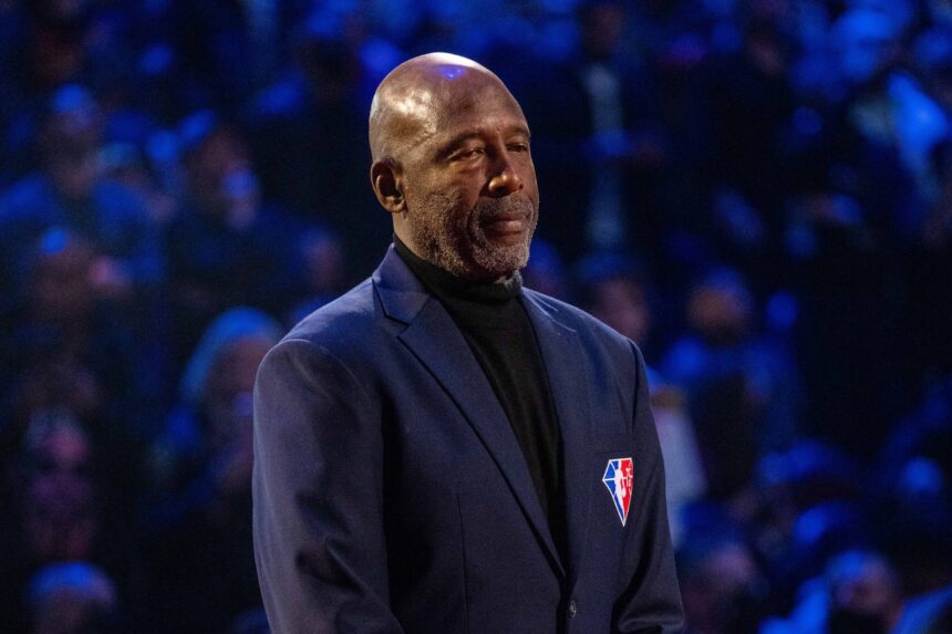 Cleveland, Ohio, USA; NBA great James Worthy is honored for being selected to the NBA 75th Anniversary Team during halftime in the 2022 NBA All-Star Game at Rocket Mortgage FieldHouse. Mandatory Credit: Kyle Terada-Imagn Images