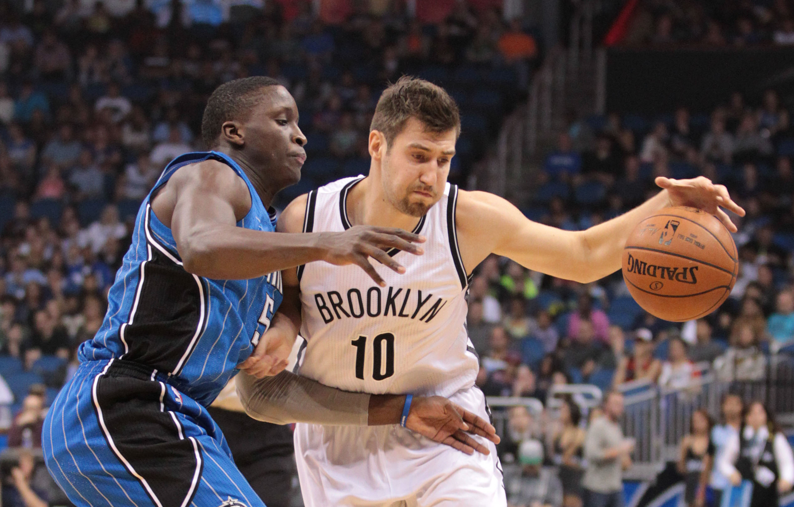 Jan 2, 2015; Orlando, FL, USA; Orlando Magic guard Victor Oladipo (5) guards against Brooklyn Nets guard Sergey Karasev (10) during the first quarter of a NBA basketball game at Amway Center
