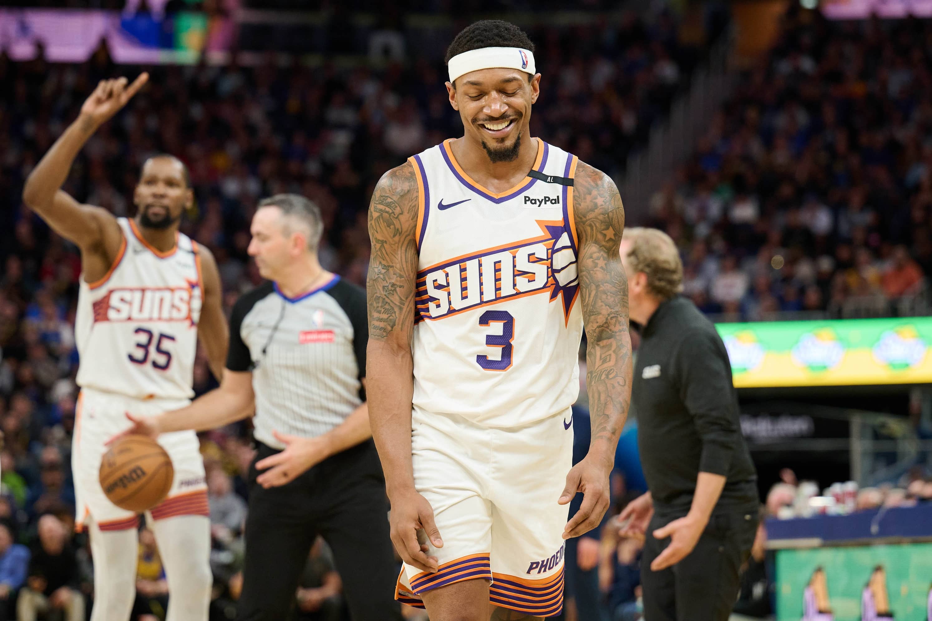 Dec 28, 2024; San Francisco, California, USA; Phoenix Suns guard Bradley Beal (3) and forward Kevin Durant (35) react to a call by referee Brett Nansel (44) during the fourth quarter at Chase Center. Mandatory Credit: Robert Edwards-Imagn Images