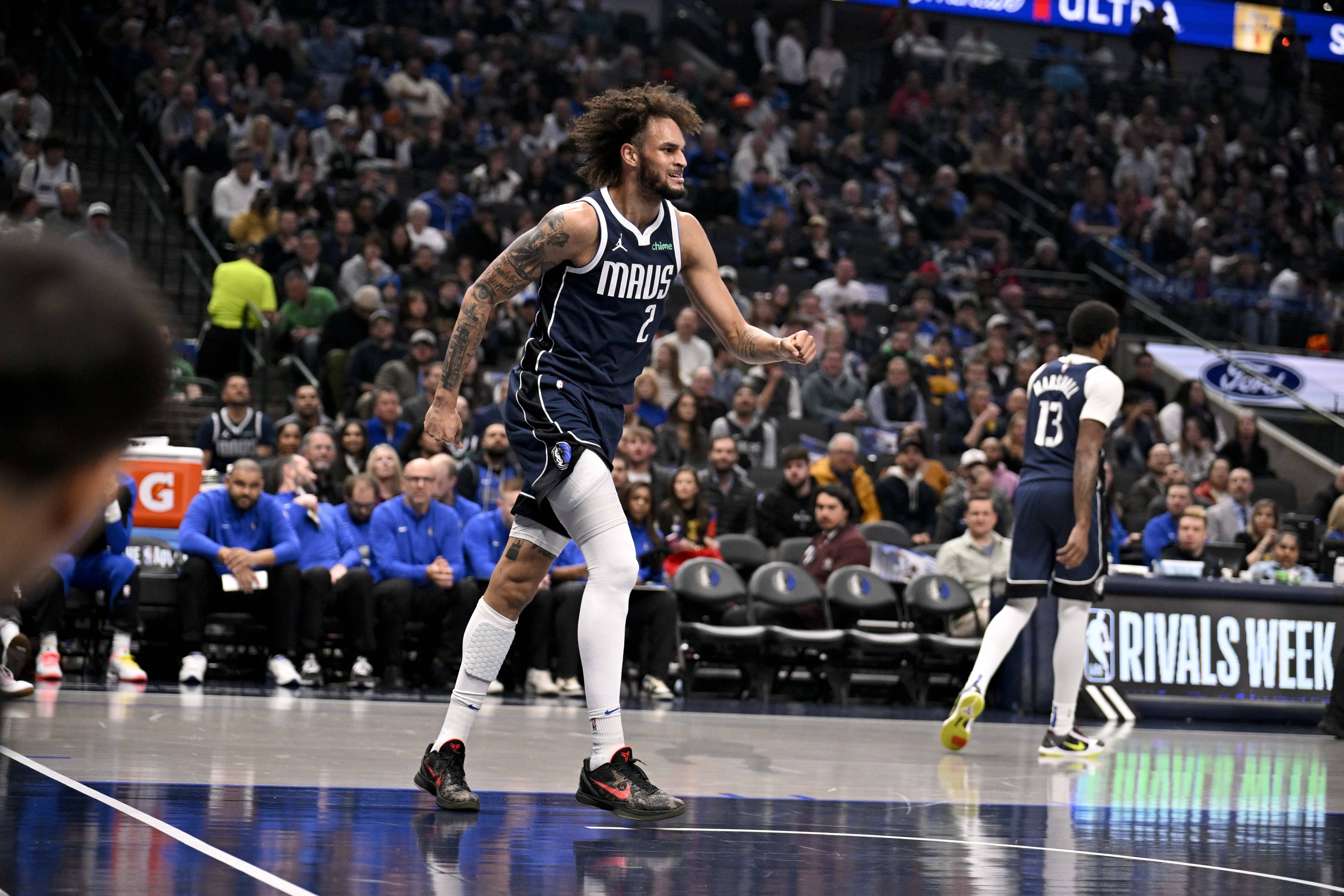 Dallas Mavericks center Dereck Lively II (2) reacts after suffering a possible leg injury during the first quarter against the Denver Nuggets at the American Airlines Center.