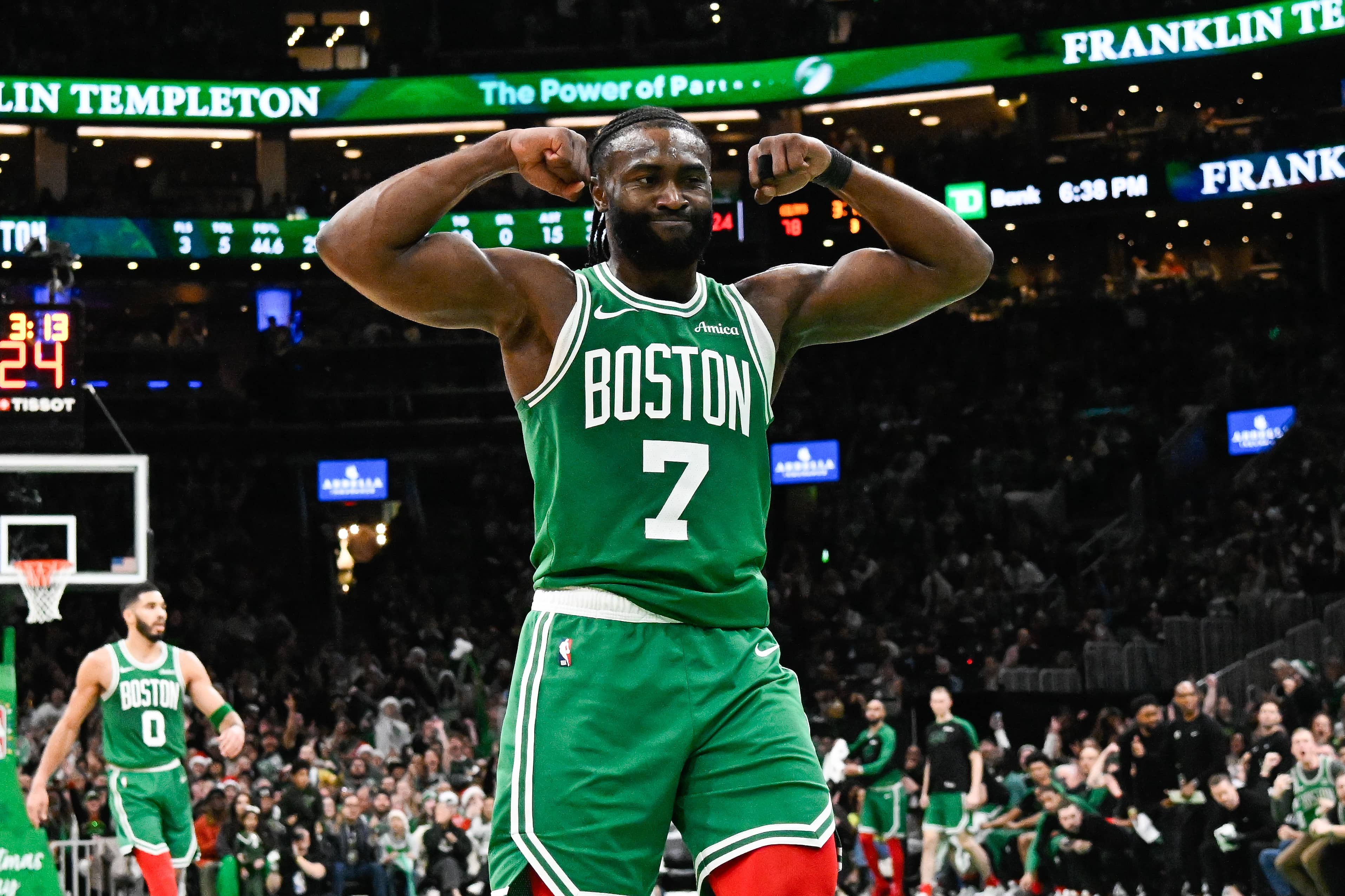 Boston, Massachusetts, USA; Boston Celtics guard Jaylen Brown (7) reacts to his basket against the Philadelphia 76ers during the second half at TD Garden. Mandatory Credit: Eric Canha-Imagn Images