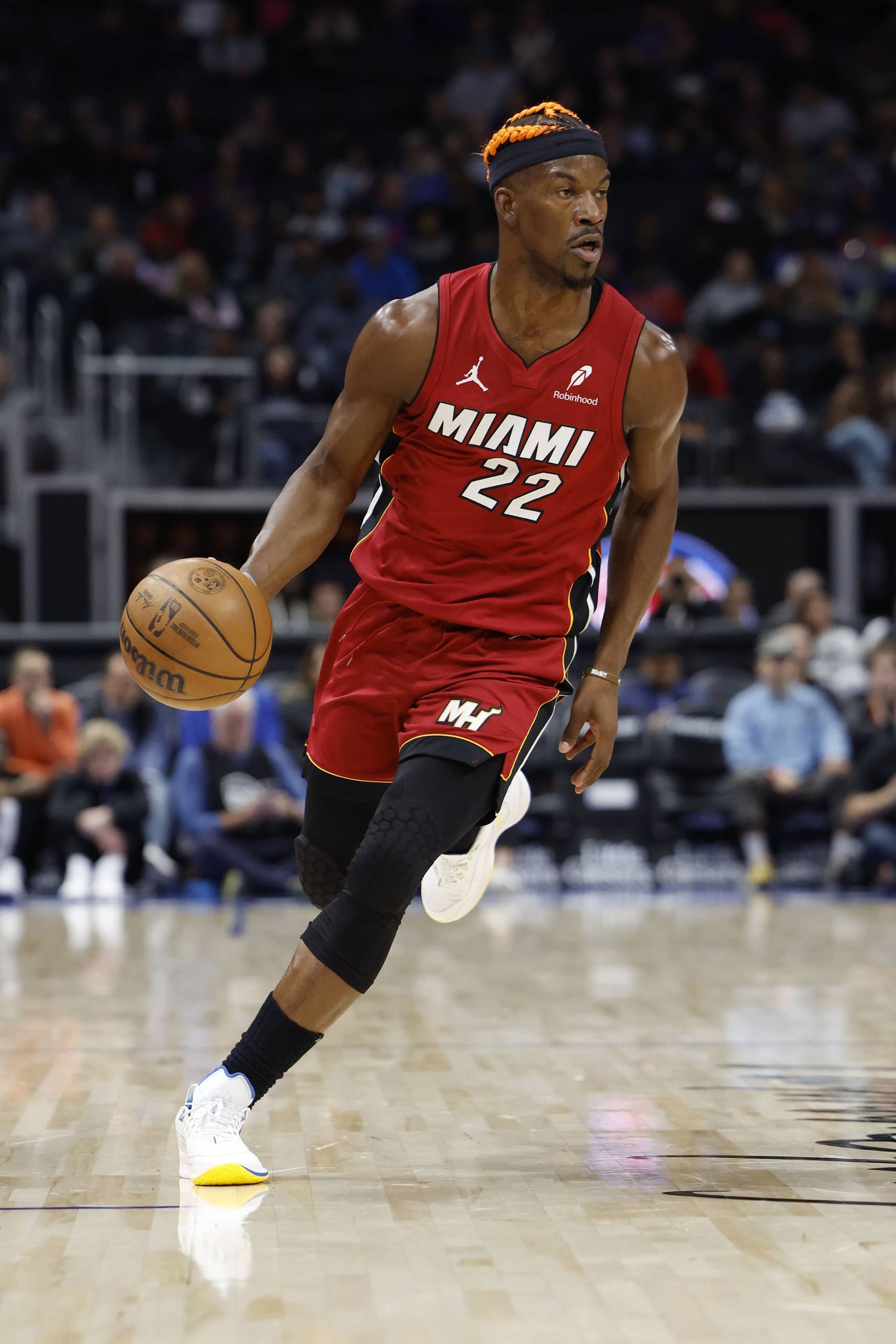 Dec 16, 2024; Detroit, Michigan, USA; Miami Heat forward Jimmy Butler (22) dribbles in the first half against the Detroit Pistons at Little Caesars Arena. Mandatory Credit: Rick Osentoski-Imagn Images