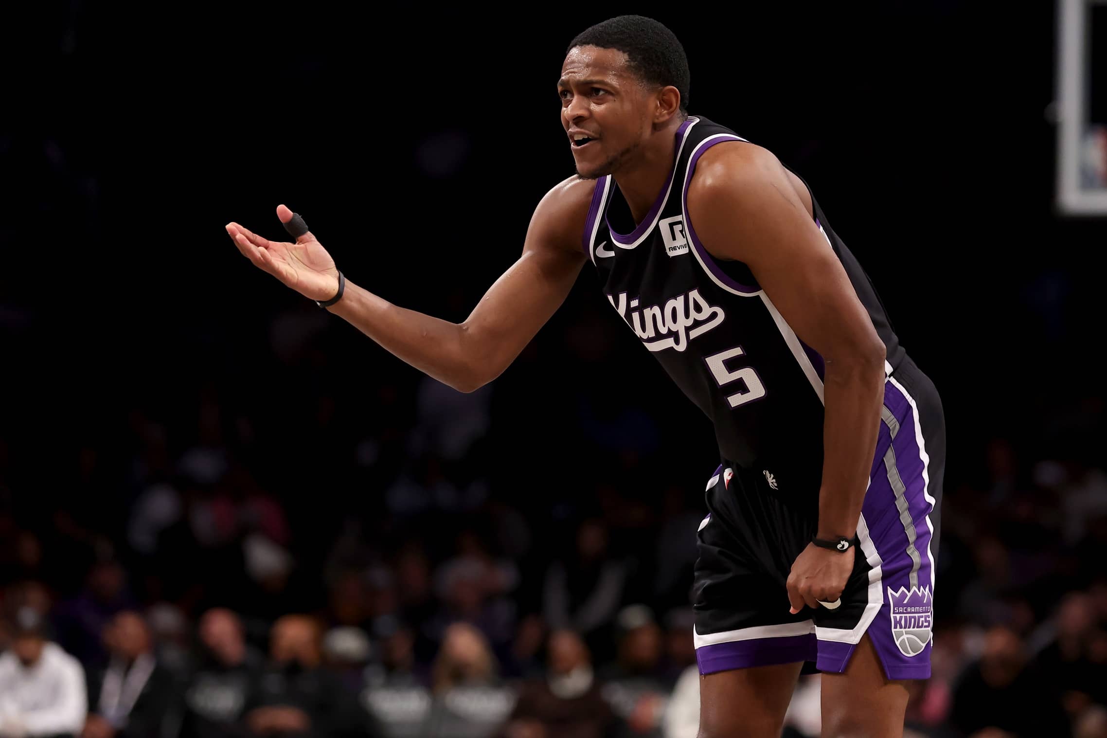 Sacramento Kings guard De'Aaron Fox (5) reacts during the second quarter against the Brooklyn Nets at Barclays Center.