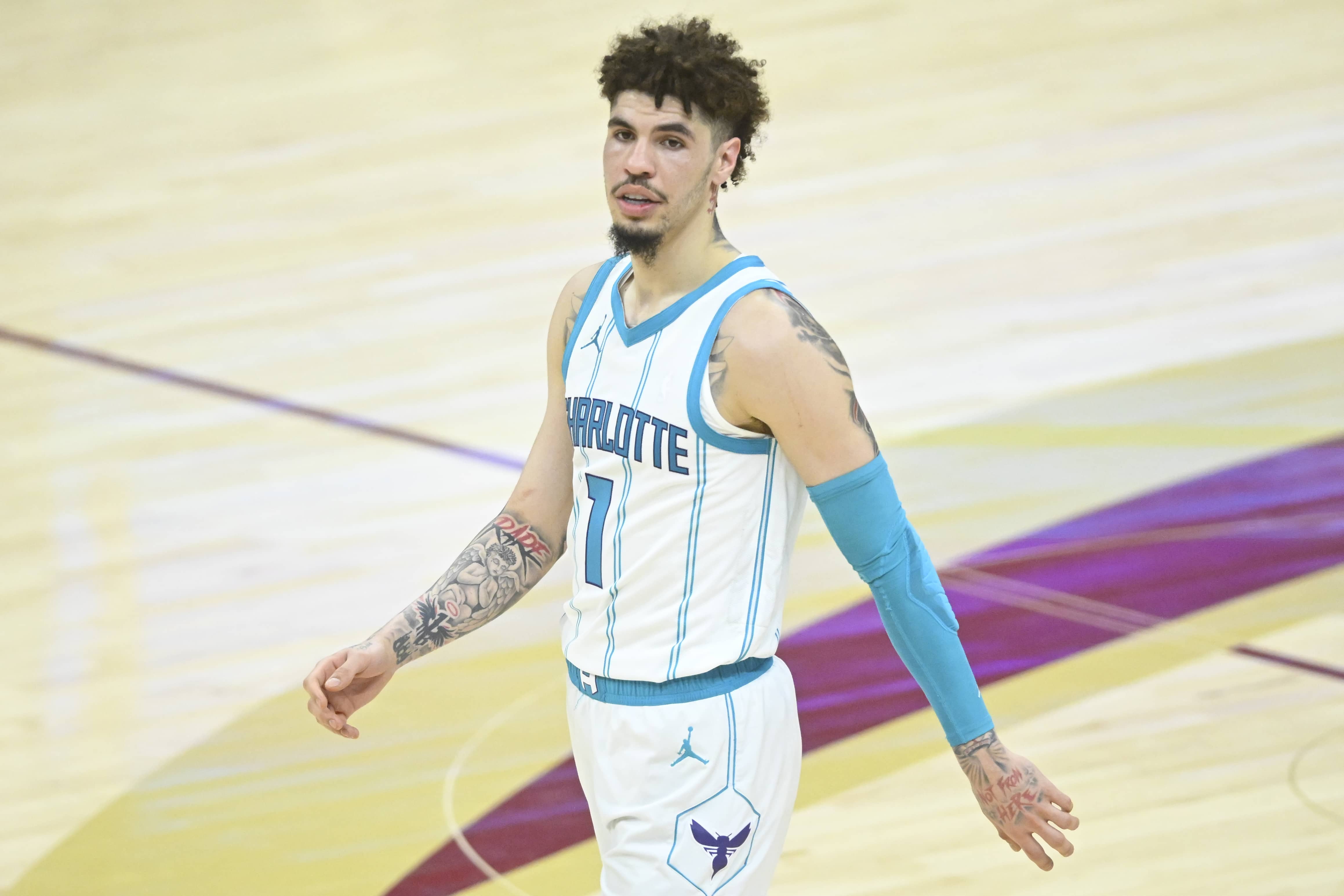 Cleveland, Ohio, USA; Charlotte Hornets guard LaMelo Ball (1) reacts in the fourth quarter against the Cleveland Cavaliers at Rocket Mortgage FieldHouse. Mandatory Credit: David Richard-Imagn Images