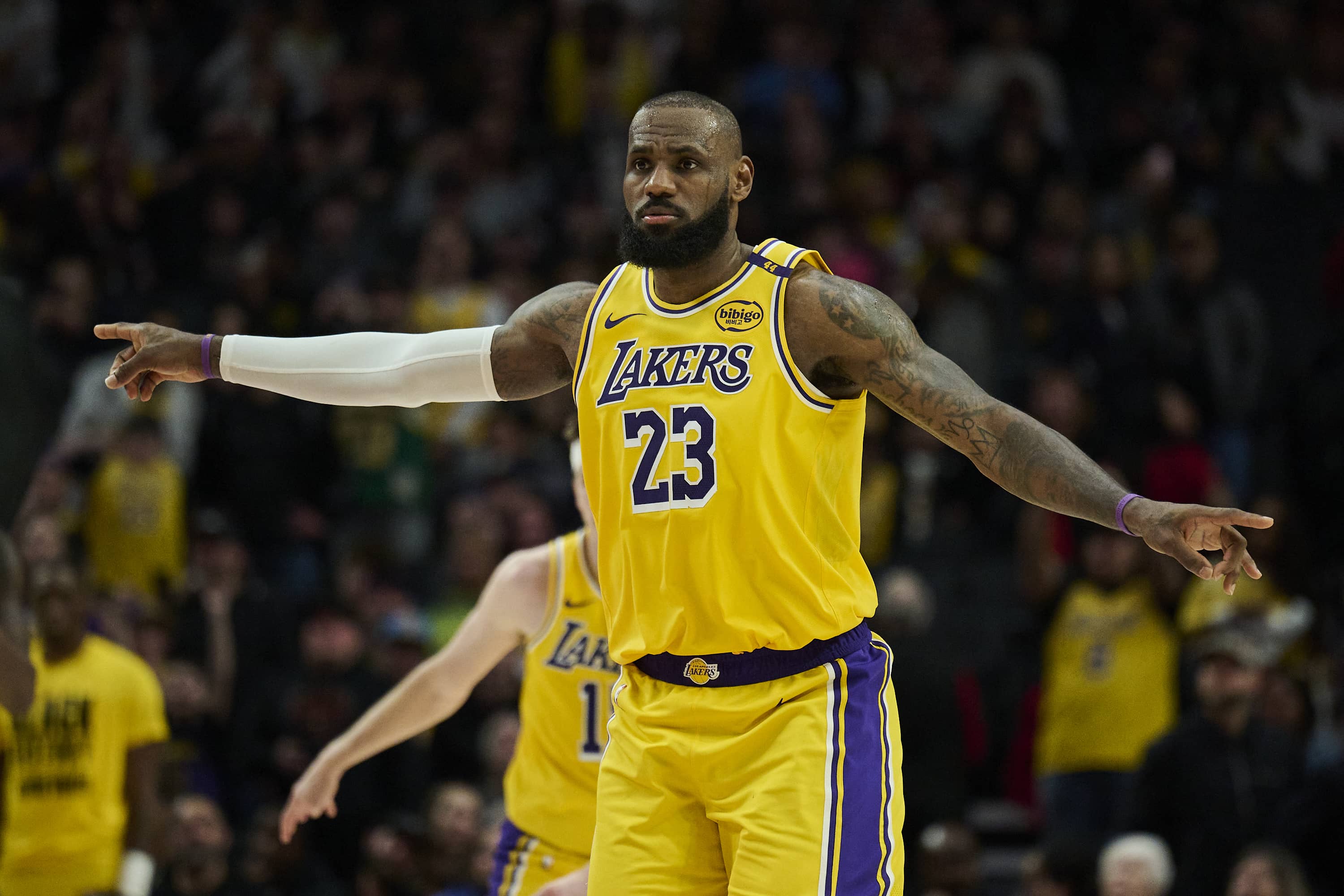 Portland, Oregon, USA; Los Angeles Lakers forward LeBron James (23) signals to teammates during the second half against the Portland Trail Blazers at Moda Center. Mandatory Credit: Troy Wayrynen-Imagn Images