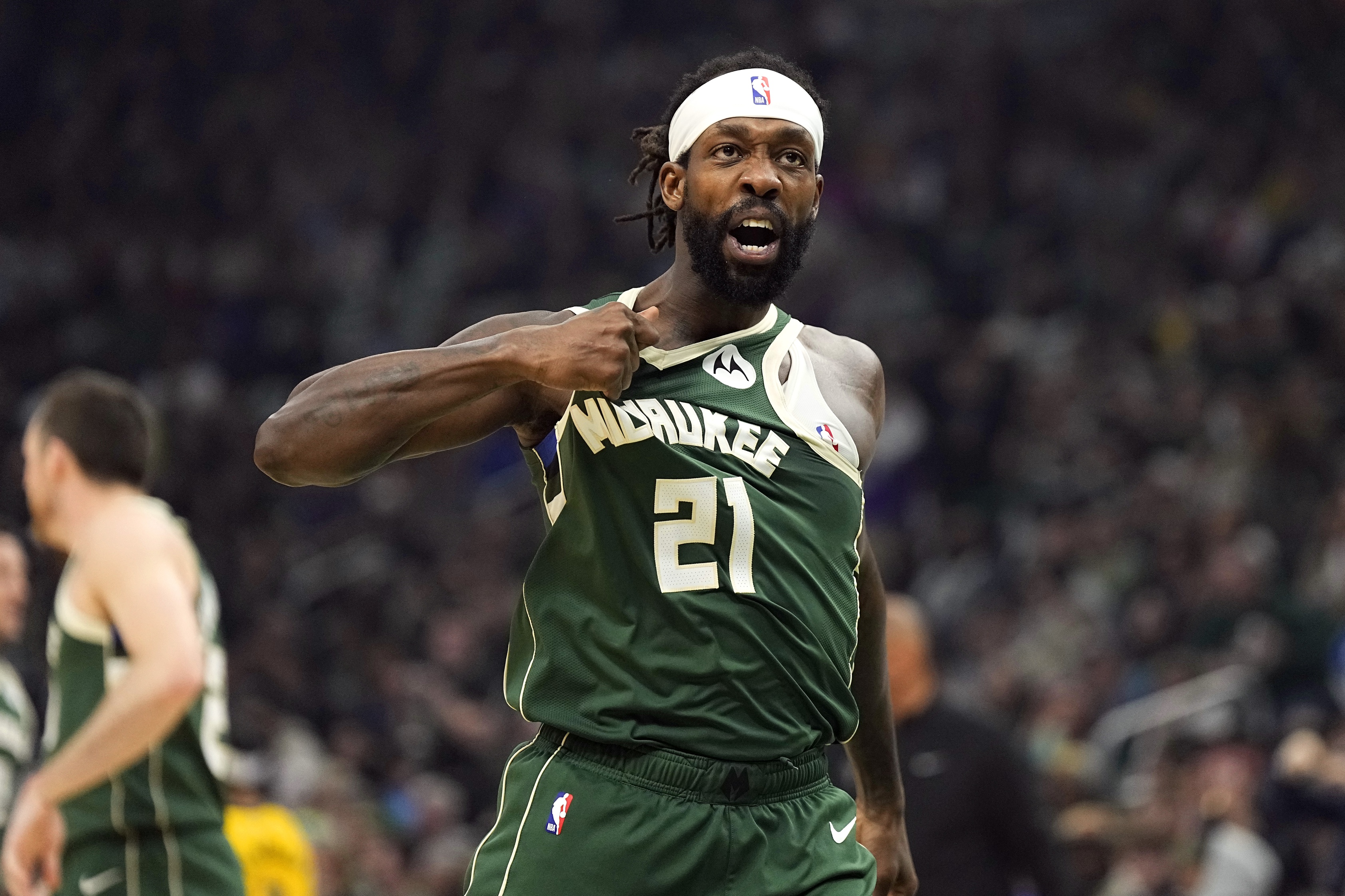 Milwaukee Bucks guard Patrick Beverley (21) gestures towards the crowd following a play during the second quarter against the Indiana Pacers during game five of the first round for the 2024 NBA playoffs at Fiserv Forum. Mandatory Credit: Jeff Hanisch-Imagn Images
