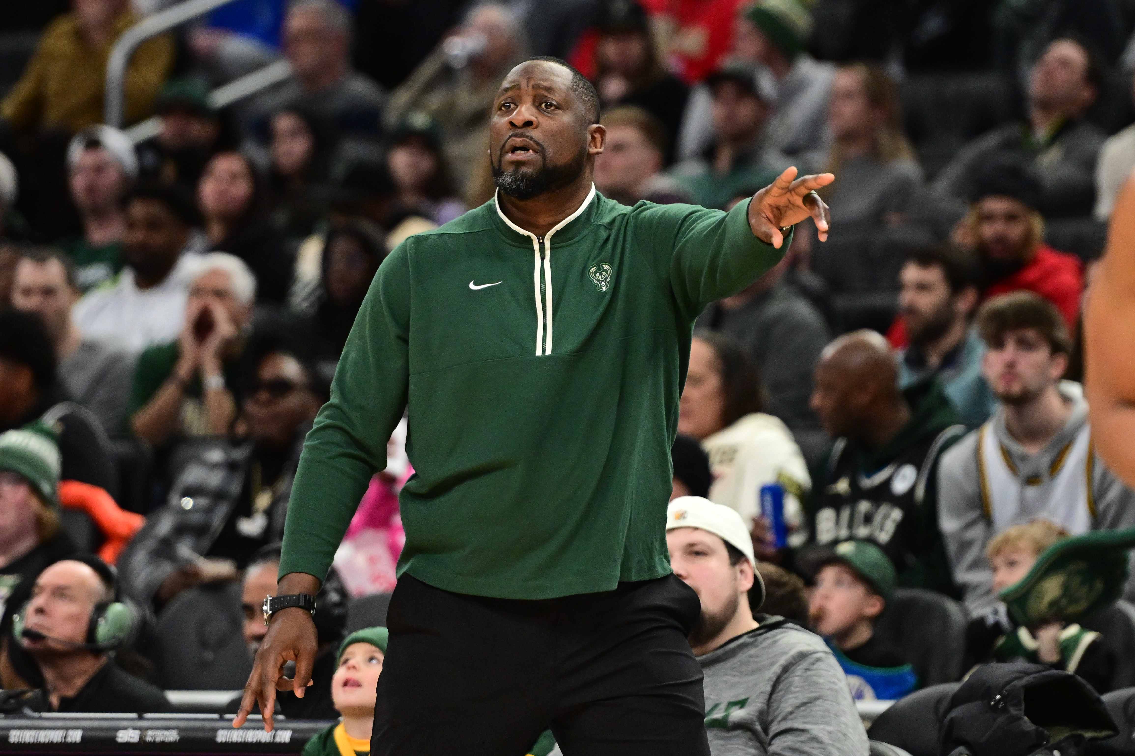 Jan 14, 2024; Milwaukee, Wisconsin, USA; Milwaukee Bucks head coach Adrian Griffin calls a play in the fourth quarter against the Sacramento Kings at Fiserv Forum. Mandatory Credit: Benny Sieu-Imagn Images  