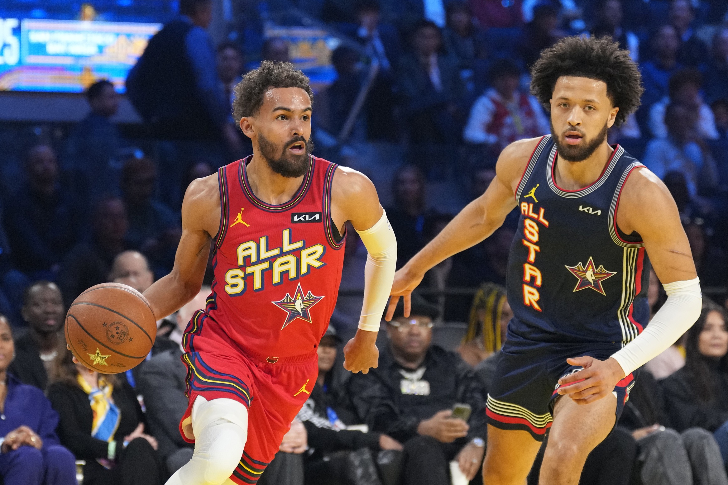 Chuck’s Global Stars guard Trae Young (11) of the Atlanta Hawks controls the ball against Kenny’s Young Stars guard Cade Cunningham (2) of the Detroit Pistons during the 2025 NBA All Star Game at Chase Center. Mandatory Credit: Kyle Terada-Imagn Images