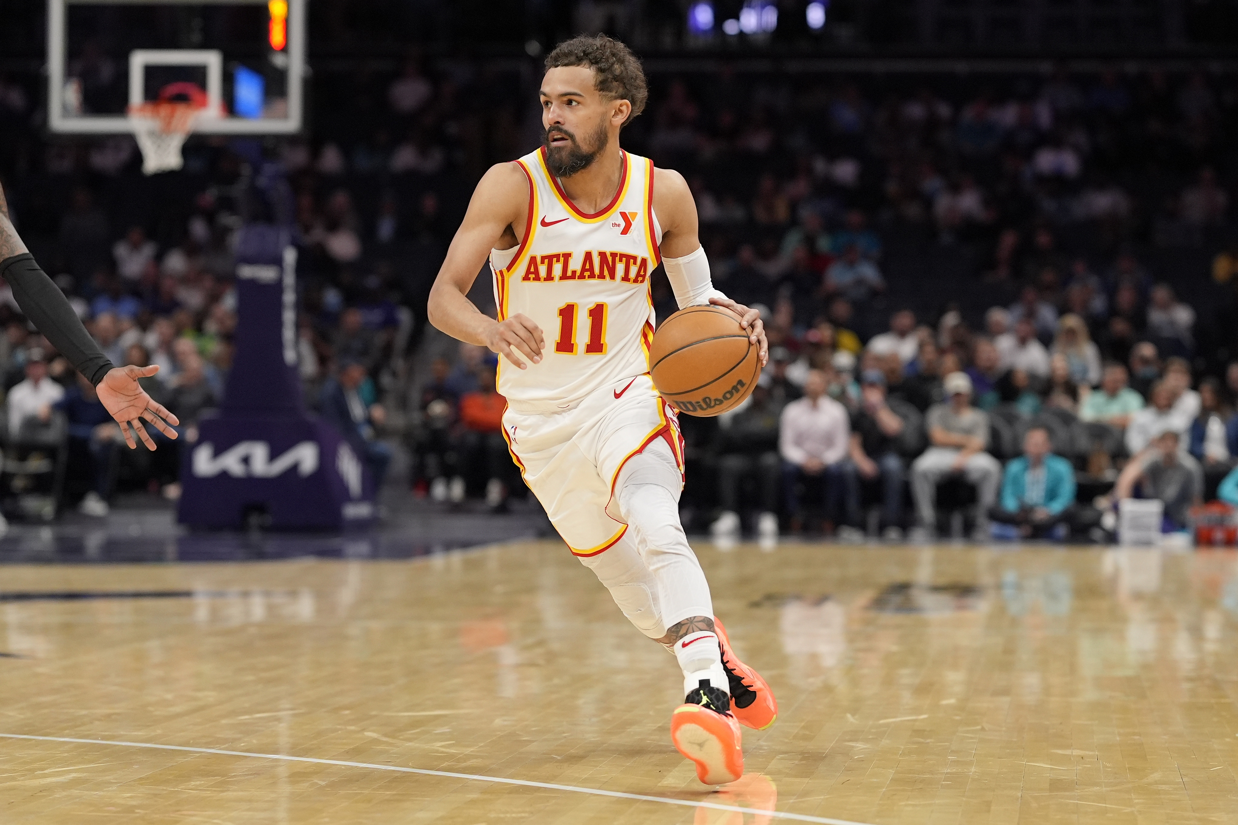Mar 18, 2025; Charlotte, North Carolina, USA; Atlanta Hawks guard Trae Young (11) brings the ball up court against the Charlotte Hornets during second quarter at Spectrum Center. Mandatory Credit: Jim Dedmon-Imagn Images  