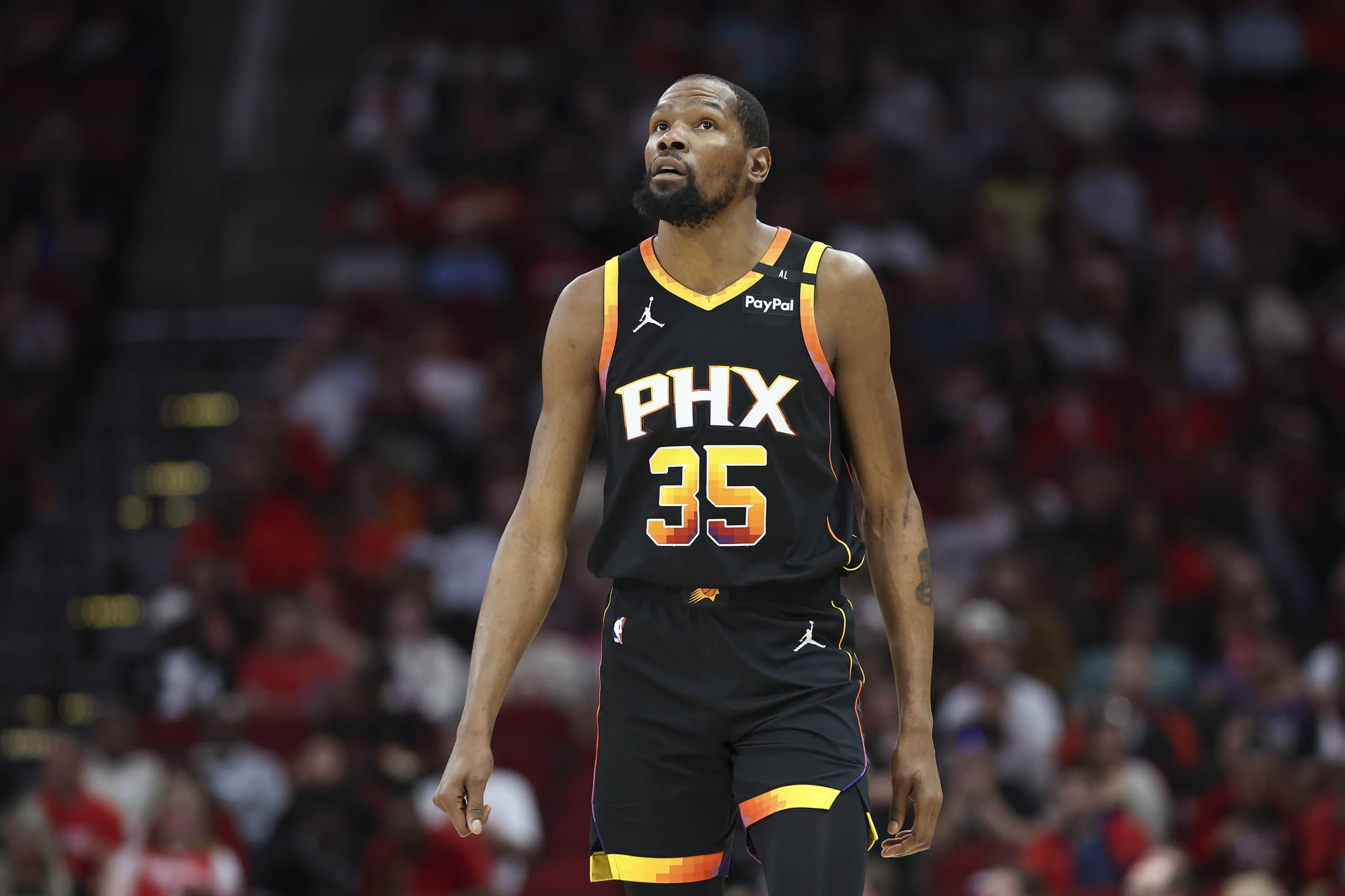 Phoenix Suns forward Kevin Durant (35) reacts after a play during the first half against the Houston Rockets at Toyota Center.