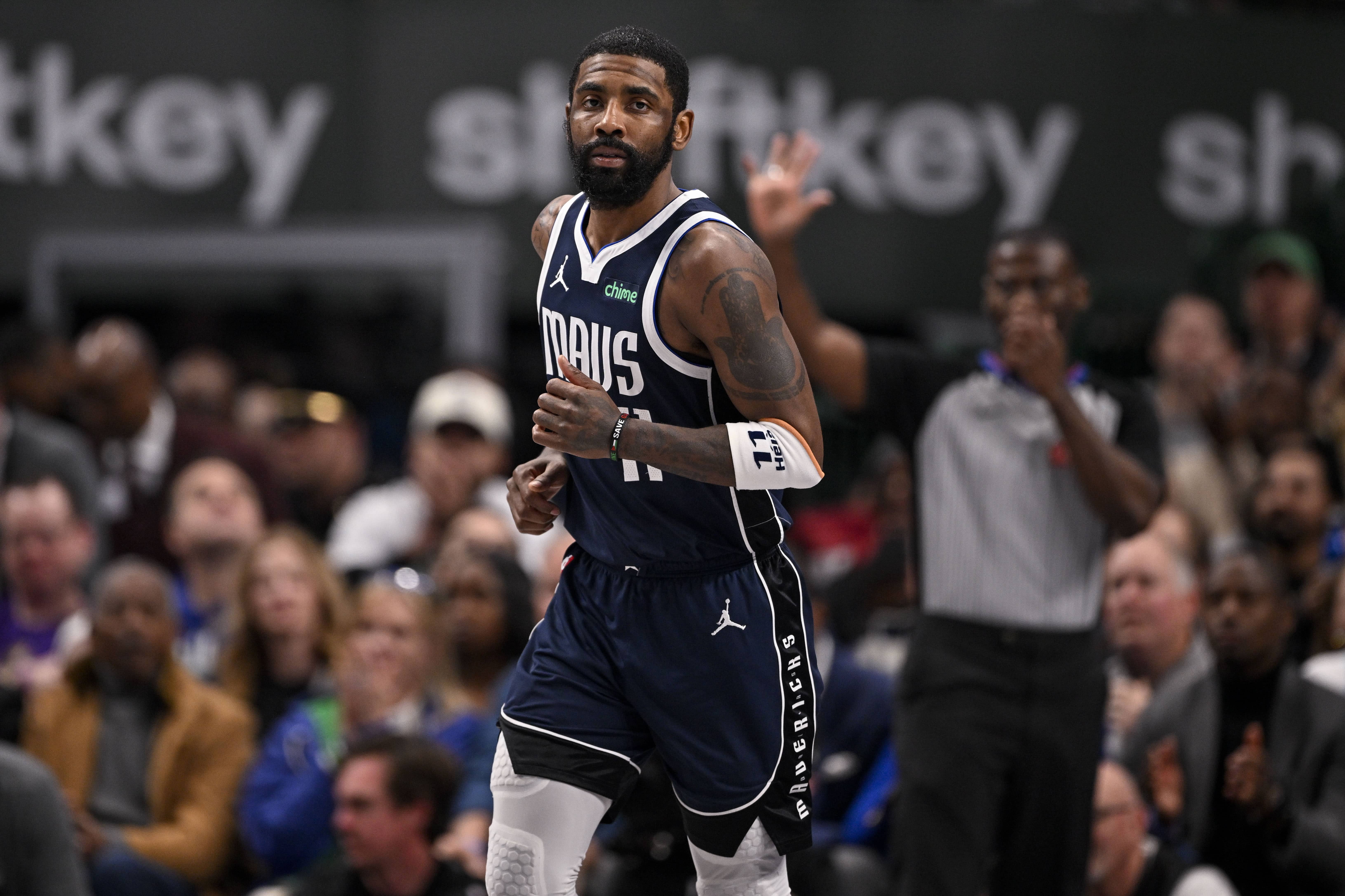 Dallas, Texas, USA; Dallas Mavericks guard Kyrie Irving (11) in action during the game between the Dallas Mavericks and the Golden State Warriors at the American Airlines Center. Mandatory Credit: Jerome Miron-Imagn Images