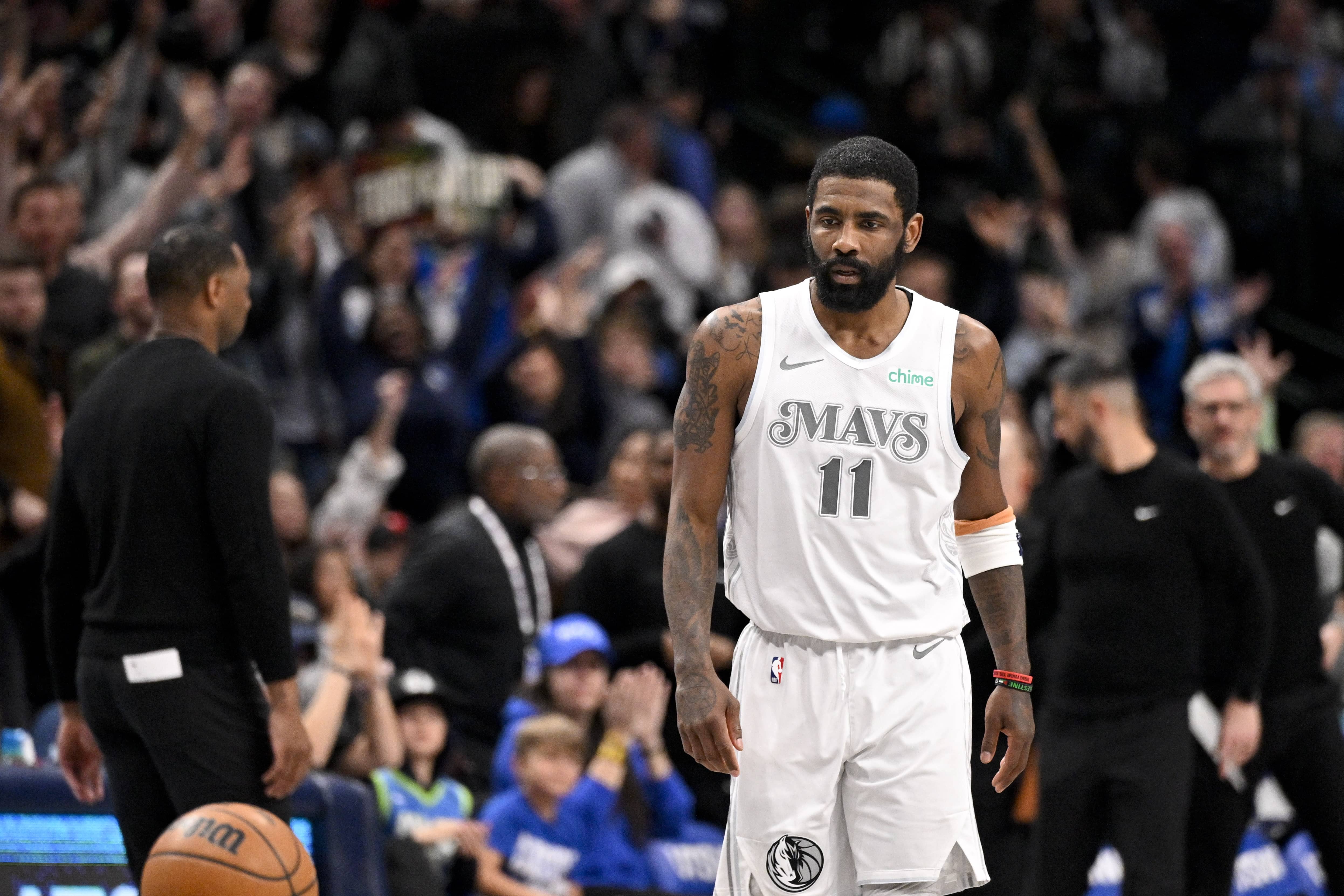 Dallas, Texas, USA; Dallas Mavericks guard Kyrie Irving (11) looks on after he makes a three point shot against the New Orleans Pelicans during the second half at the American Airlines Center. Mandatory Credit: Jerome Miron-Imagn Images