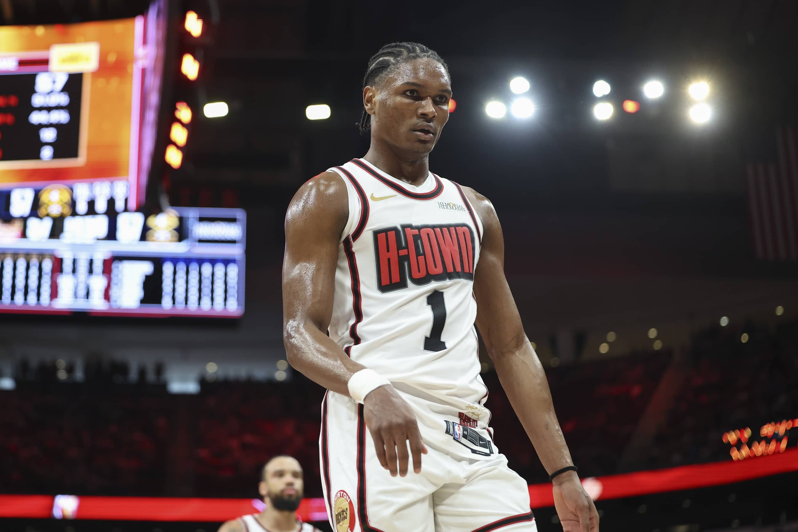 Houston Rockets forward Amen Thompson (1) walks off the court after the end of the first half against the Denver Nuggets at Toyota Center.