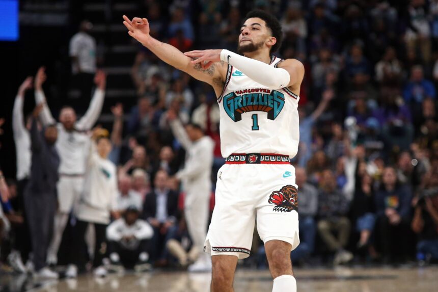 Memphis, Tennessee, USA; Memphis Grizzlies guard Scotty Pippen Jr. (1) reacts after a three point basket during the second half against the Los Angeles Lakers at FedExForum. Mandatory Credit: Petre Thomas-Imagn Images