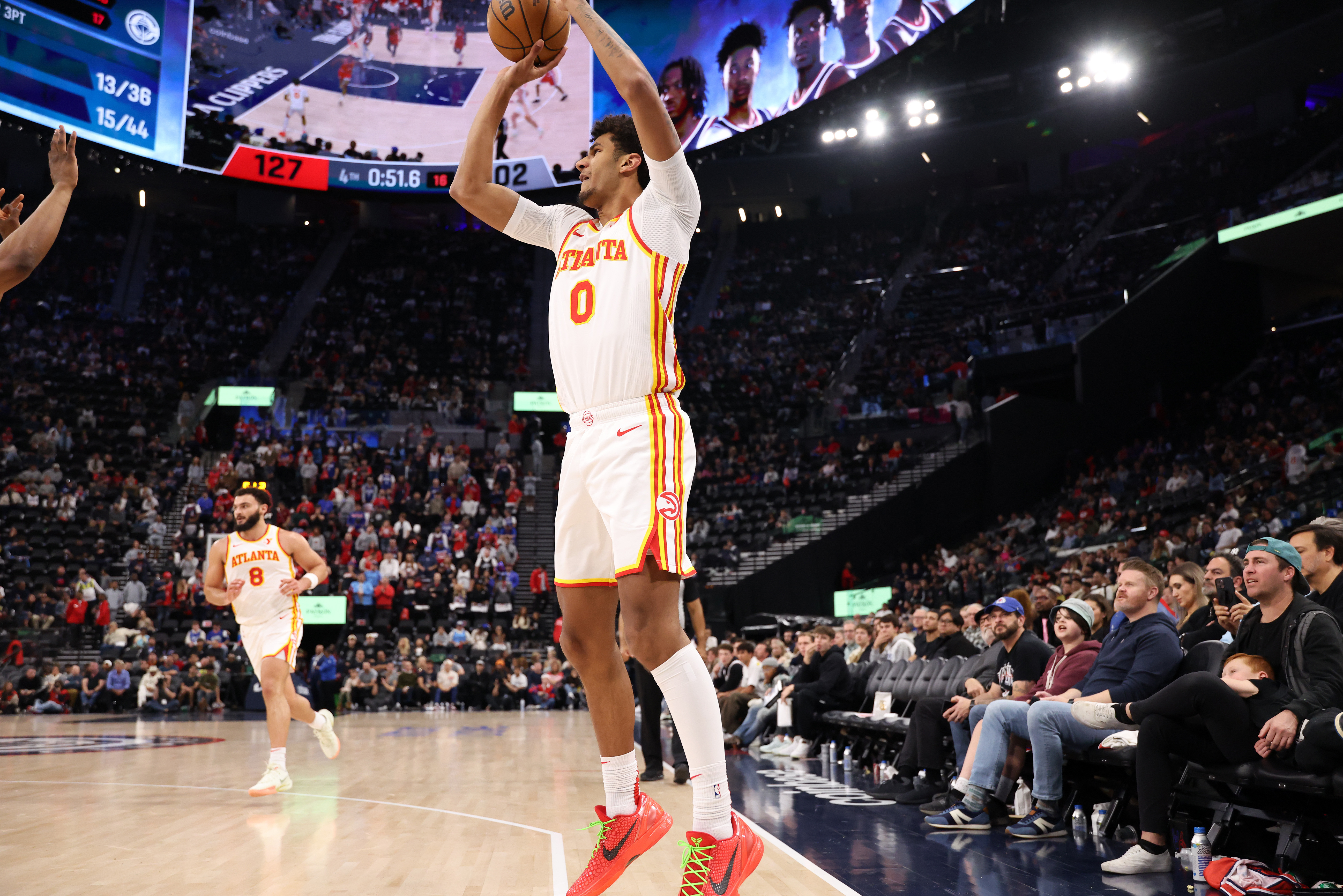 Jan 4, 2025; Inglewood, California, USA; Atlanta Hawks forward Dominick Barlow (0) shoots a three point basket against the Los Angeles Clippers during the second half at Intuit Dome. Mandatory Credit: Kiyoshi Mio-Imagn Images