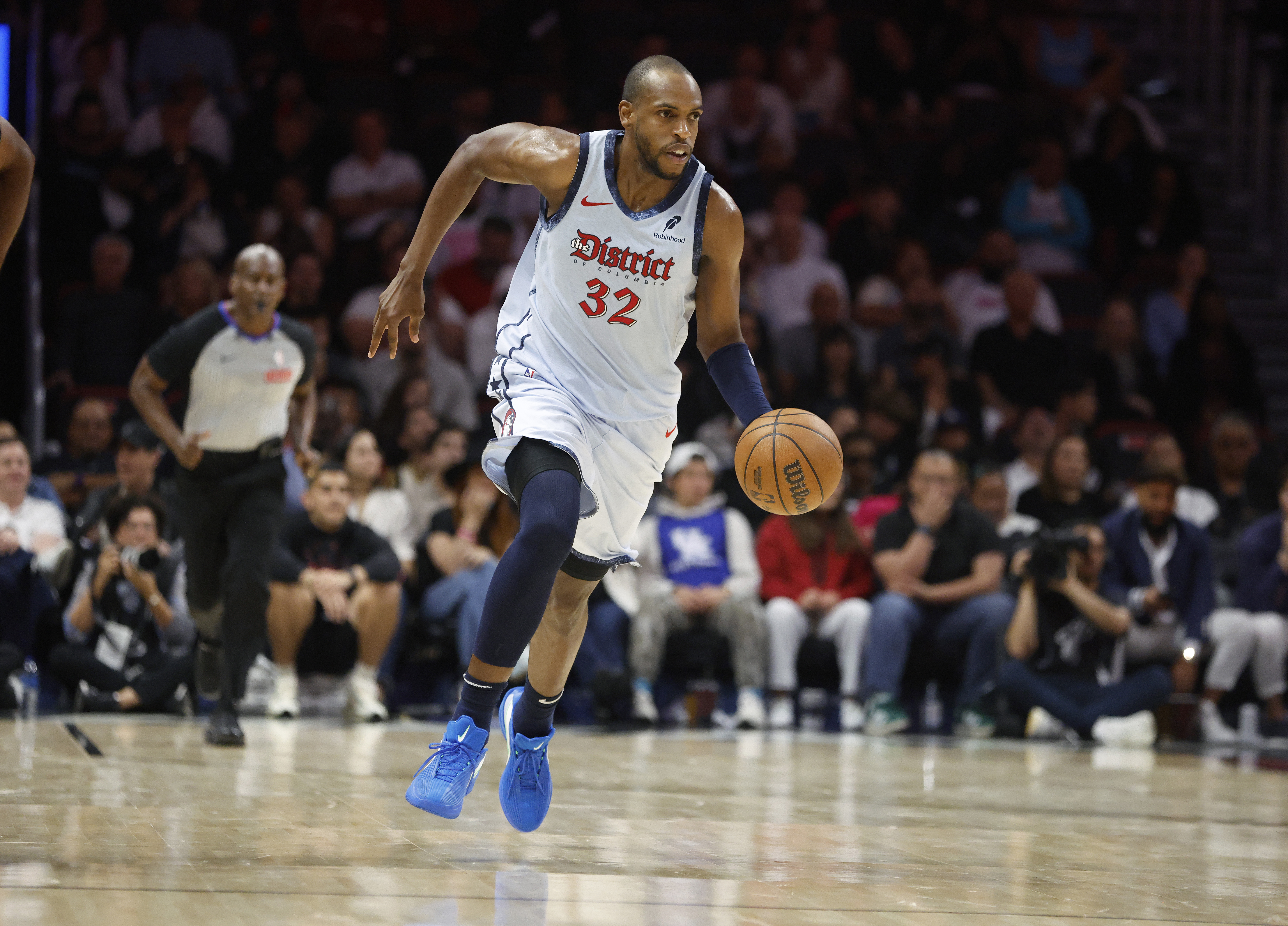 Mar 3, 2025; Miami, Florida, USA; Washington Wizards forward Khris Middleton (32) brings the ball up court against the Miami Heat during the second half at Kaseya Center. Mandatory Credit: Rhona Wise-Imagn Images  