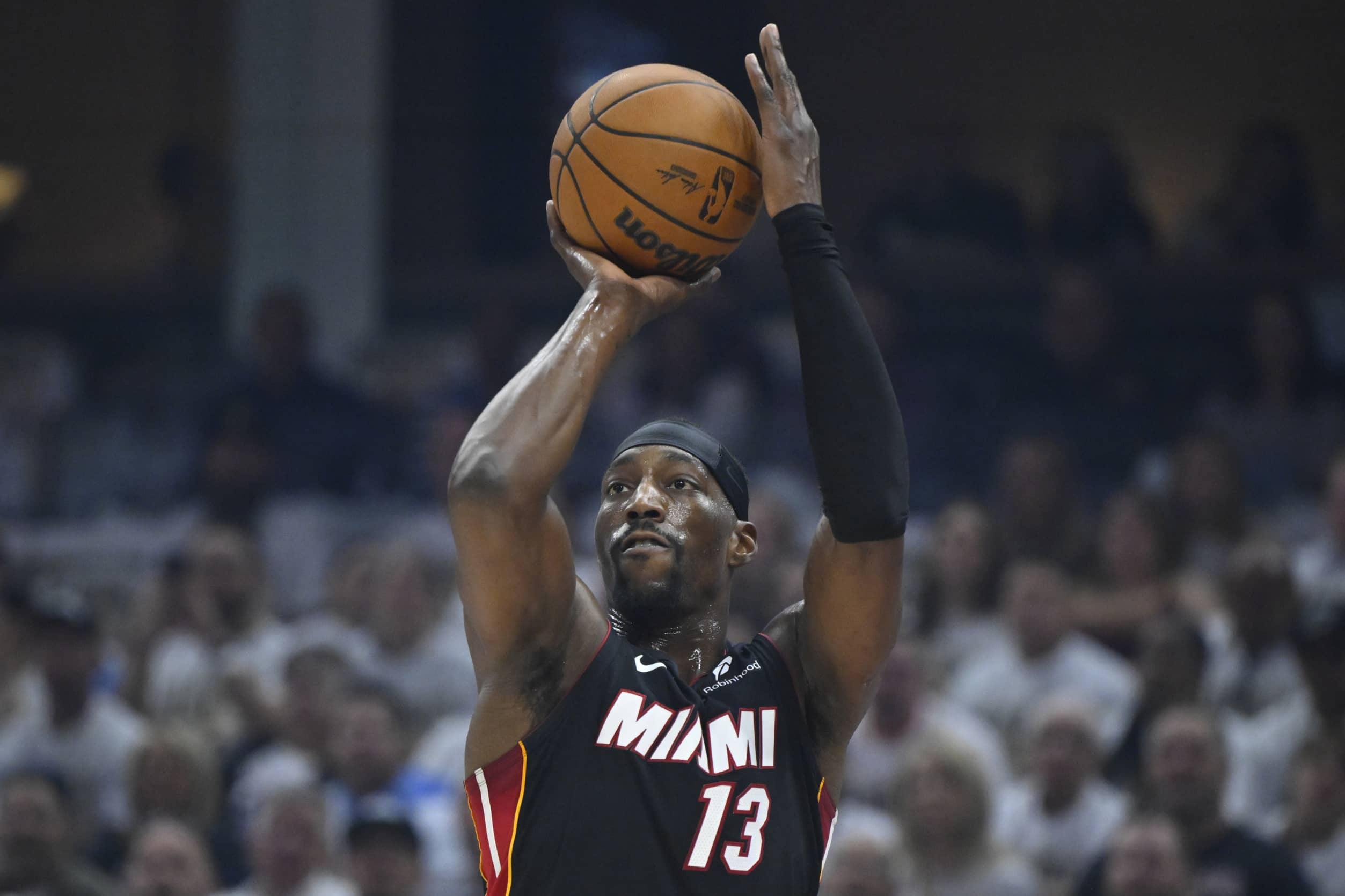 Cleveland, Ohio, USA; Miami Heat center Bam Adebayo (13) shoots in the first quarter of game two of the first round of the 2025 NBA Playoffs against the Cleveland Cavaliers at Rocket Arena. Mandatory Credit: David Richard-Imagn Images