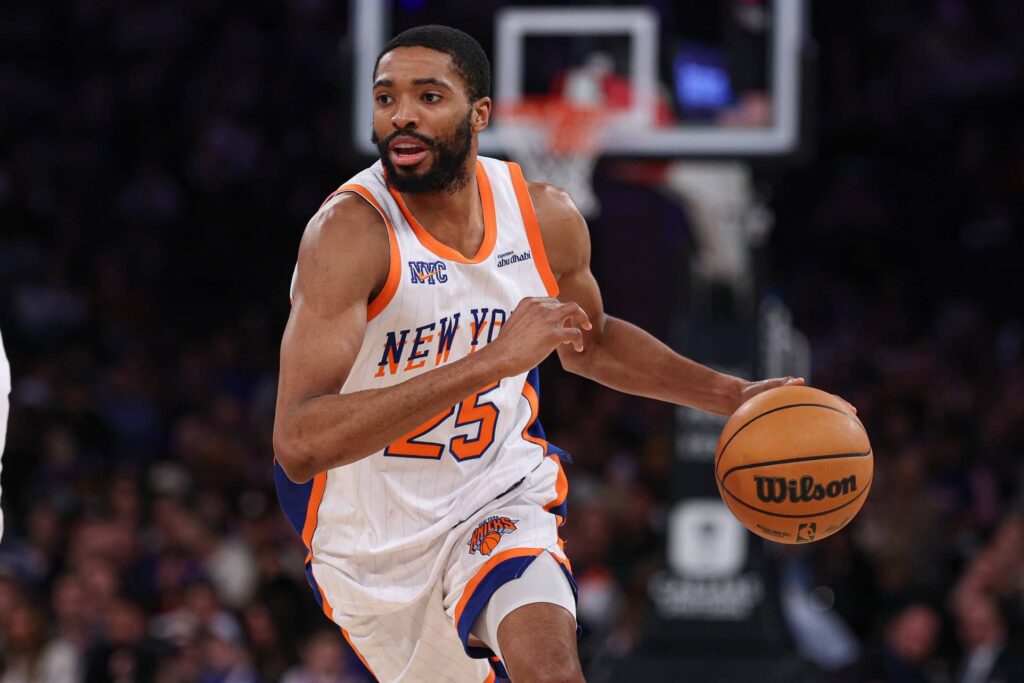 Mar 22, 2025; New York, New York, USA; New York Knicks forward Mikal Bridges (25) dribbles up court during the first half against the Washington Wizards at Madison Square Garden. Mandatory Credit: Vincent Carchietta-Imagn Images