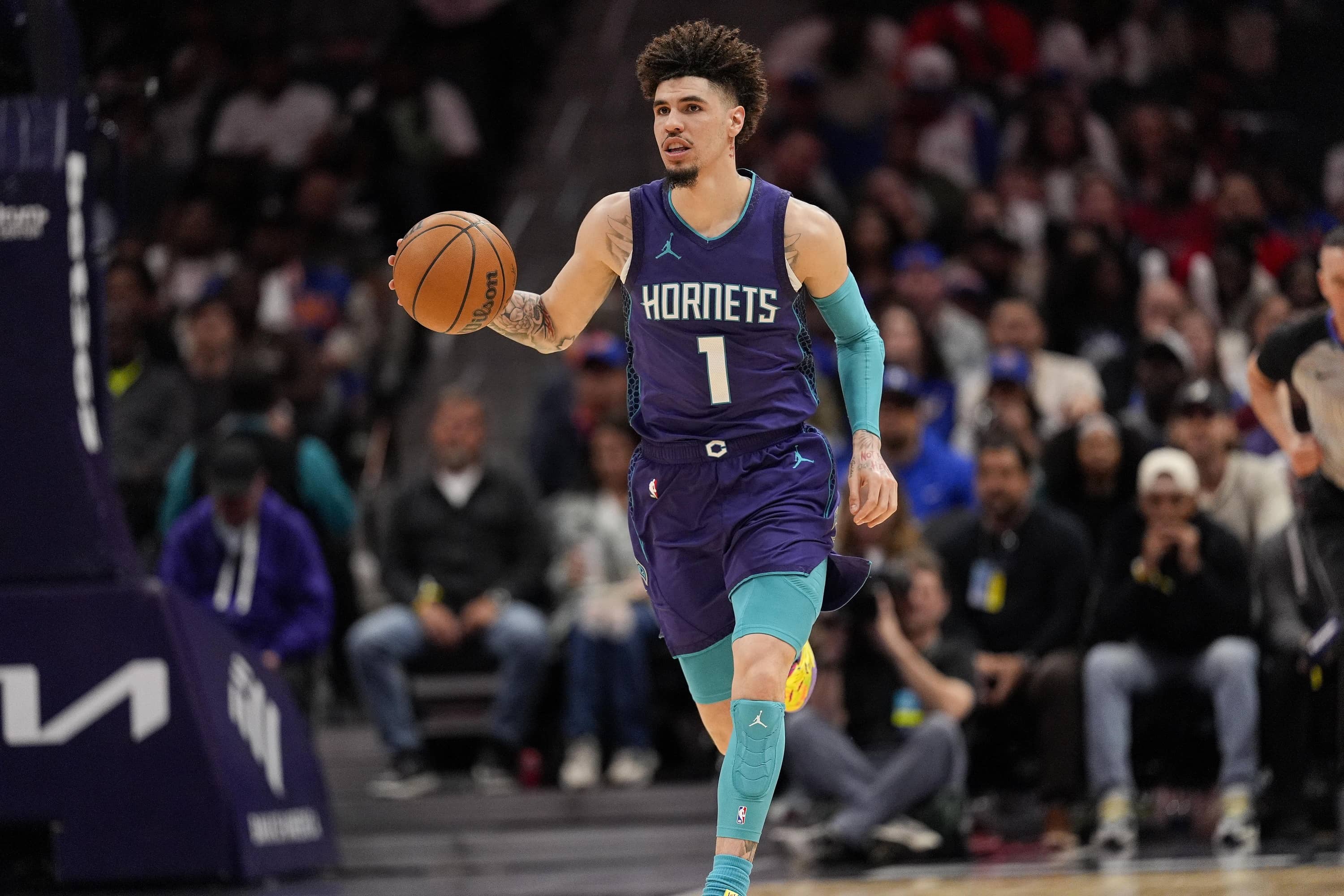 Charlotte, North Carolina, USA; Charlotte Hornets guard LaMelo Ball (1) brings the ball up court against the New York Knicks during the second half at Spectrum Center. Mandatory Credit: Jim Dedmon-Imagn Images