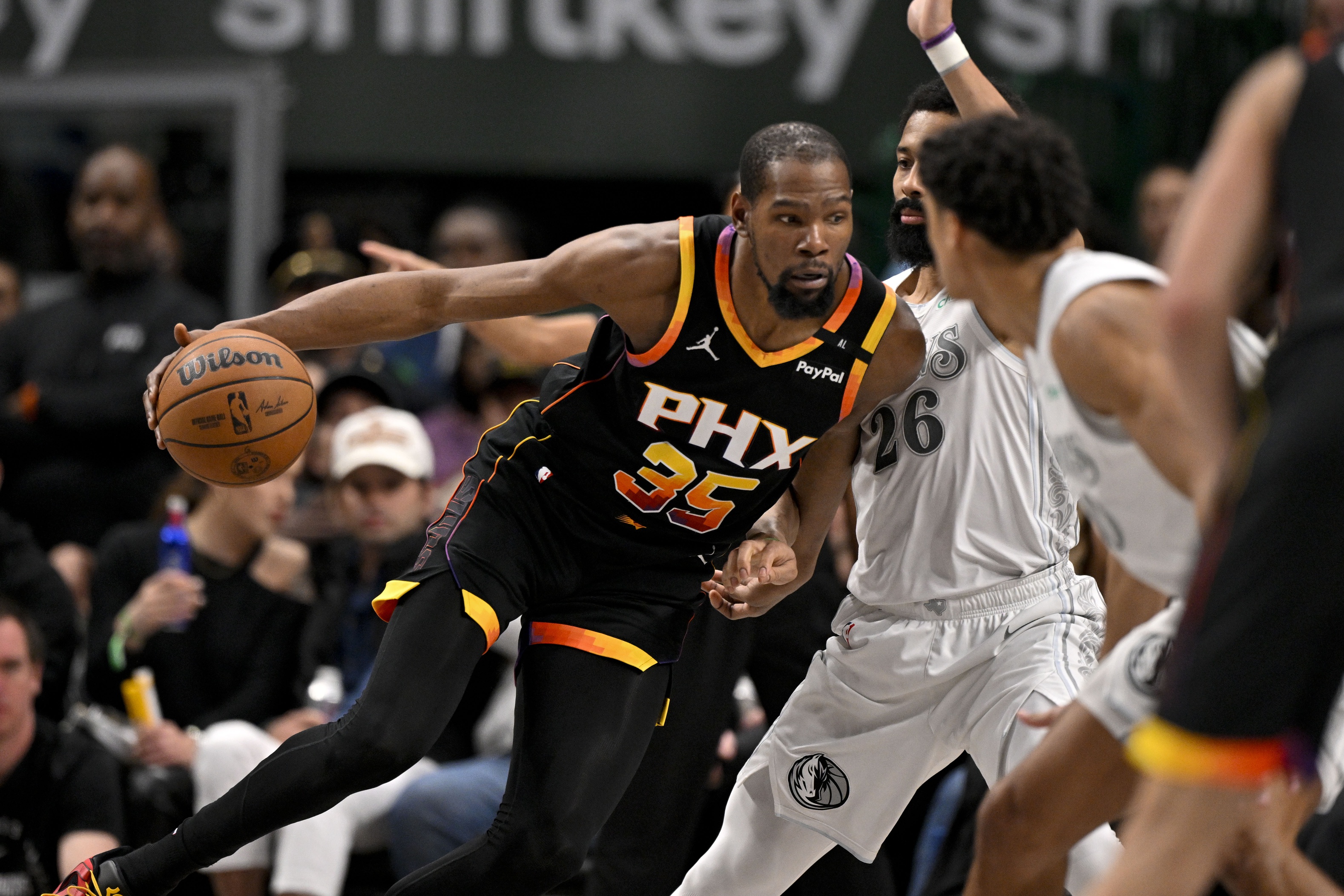 Phoenix Suns forward Kevin Durant (35) moves to the basket against Dallas Mavericks guard Spencer Dinwiddie (26) during the second half at the American Airlines Center. Mandatory Credit: Jerome Miron-Imagn Images