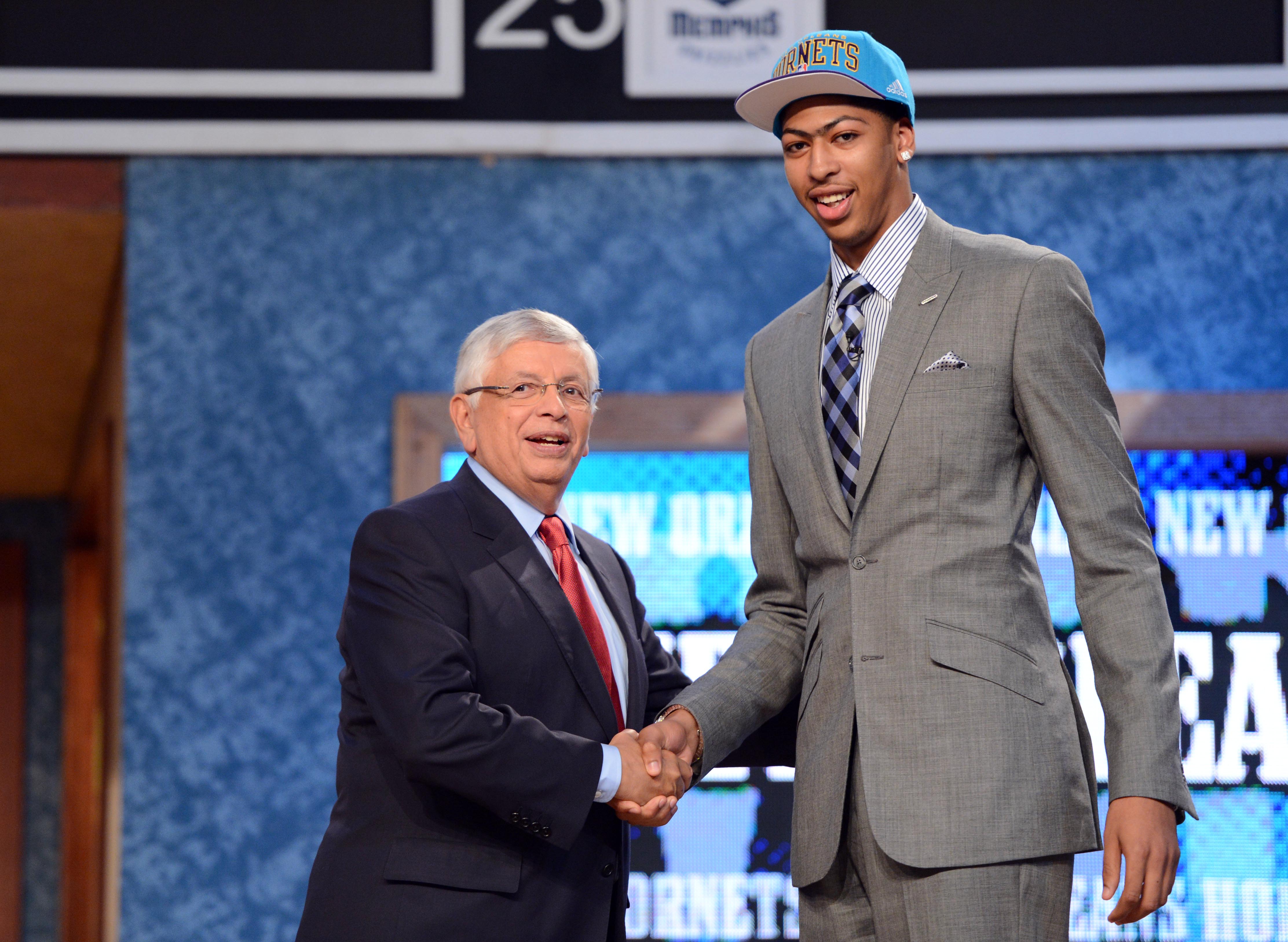 June 28, 2012; Newark, NJ, USA; Anthony Davis (Kentucky), right, is introduced as the number one overall pick to the New Orleans Hornets by NBA commissioner David Stern during the 2012 NBA Draft at the Prudential Center. Mandatory Credit: Jerry Lai-Imagn Images  