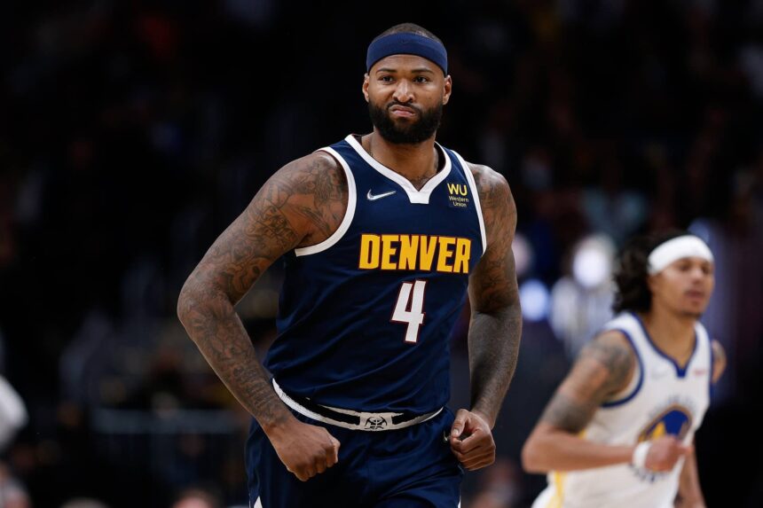 Denver, Colorado, USA; Denver Nuggets center DeMarcus Cousins (4) reacts after a play in the third quarter against the Golden State Warriors at Ball Arena. Mandatory Credit: Isaiah J. Downing-Imagn Images