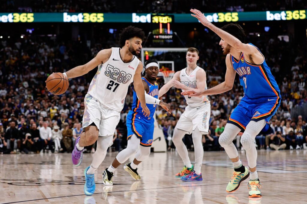 Nov 17, 2025; Denver, Colorado, USA; Denver Nuggets guard Jamal Murray (27) drives to the net in the second half against the Chicago Bulls at Ball Arena. Mandatory Credit: Ron Chenoy-Imagn Images