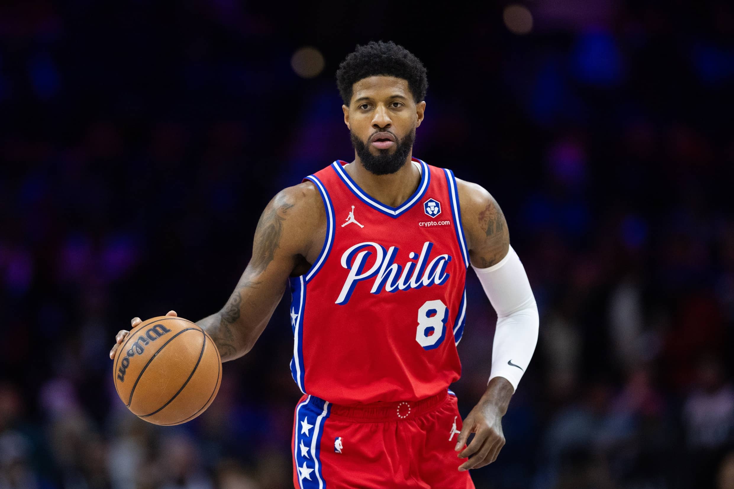 Philadelphia, Pennsylvania, USA; Philadelphia 76ers forward Paul George (8) dribbles the ball against the New Orleans Pelicans during the first quarter at Wells Fargo Center. Mandatory Credit: Bill Streicher-Imagn Images