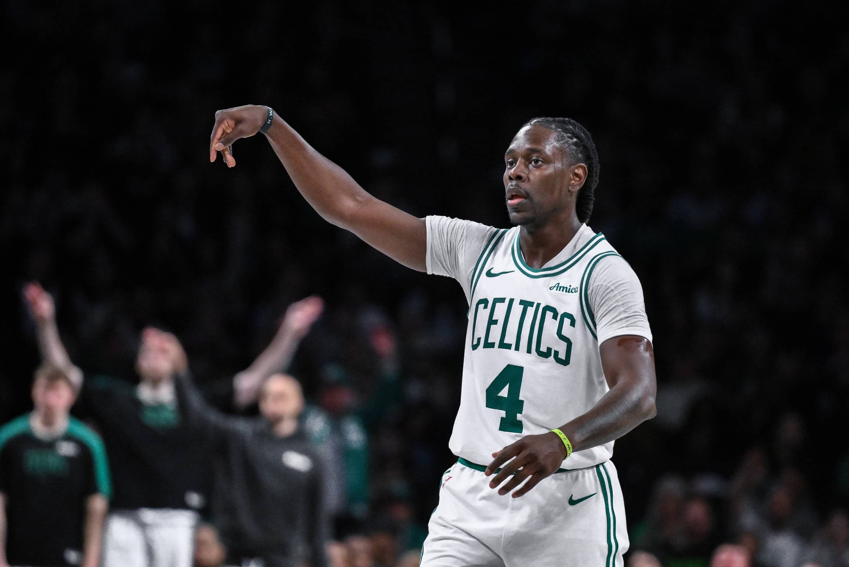 Boston Celtics guard Jrue Holiday (4) reacts after making a three-point shot ]against the Brooklyn Nets during the second half at Barclays Center.