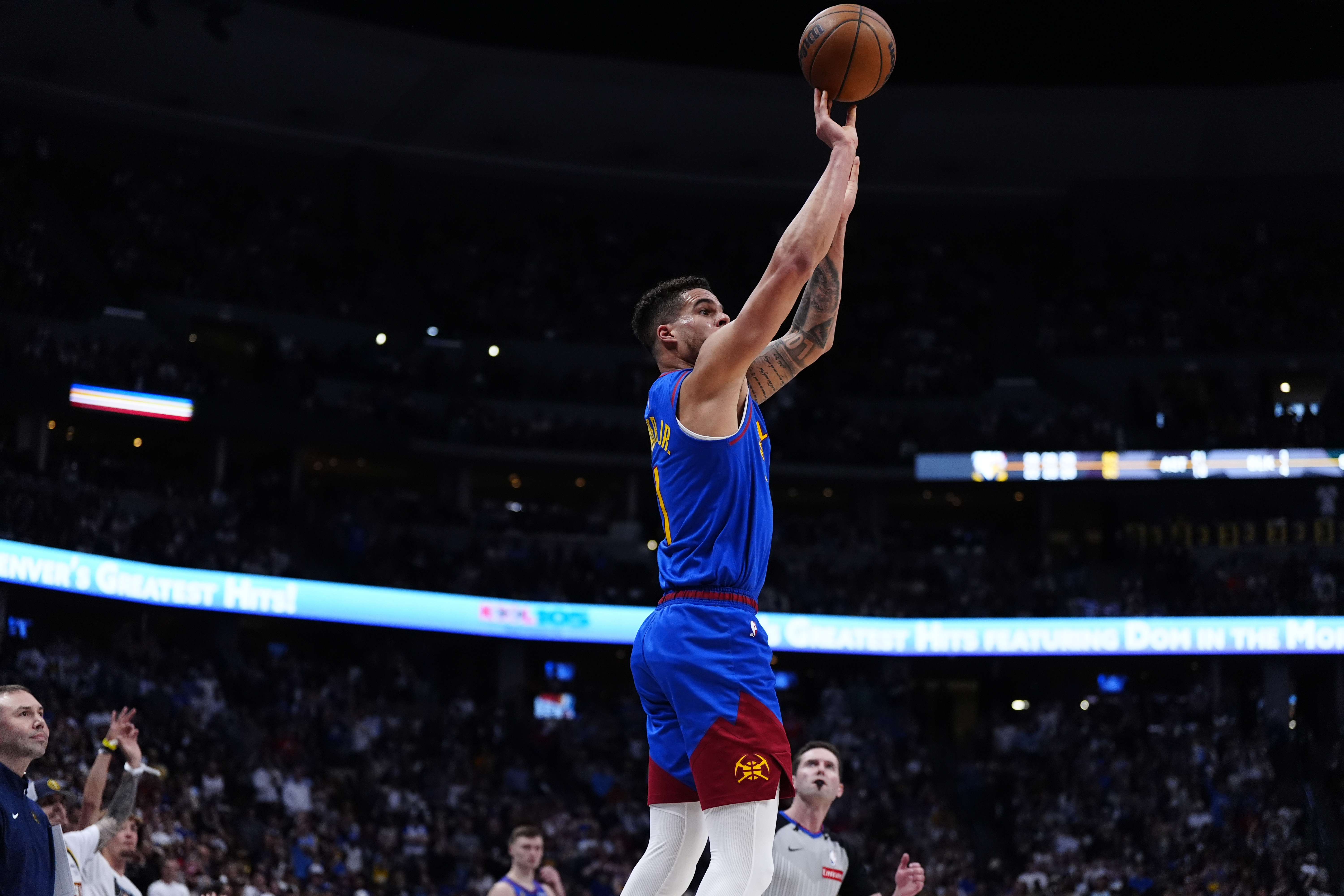 May 9, 2025; Denver, Colorado, USA; Denver Nuggets forward Michael Porter Jr. (1) shoots the ball in the fourth quarter against the Oklahoma City Thunder during game three of the second round for the 2025 NBA Playoffs at Ball Arena. Mandatory Credit: Ron Chenoy-Imagn Images