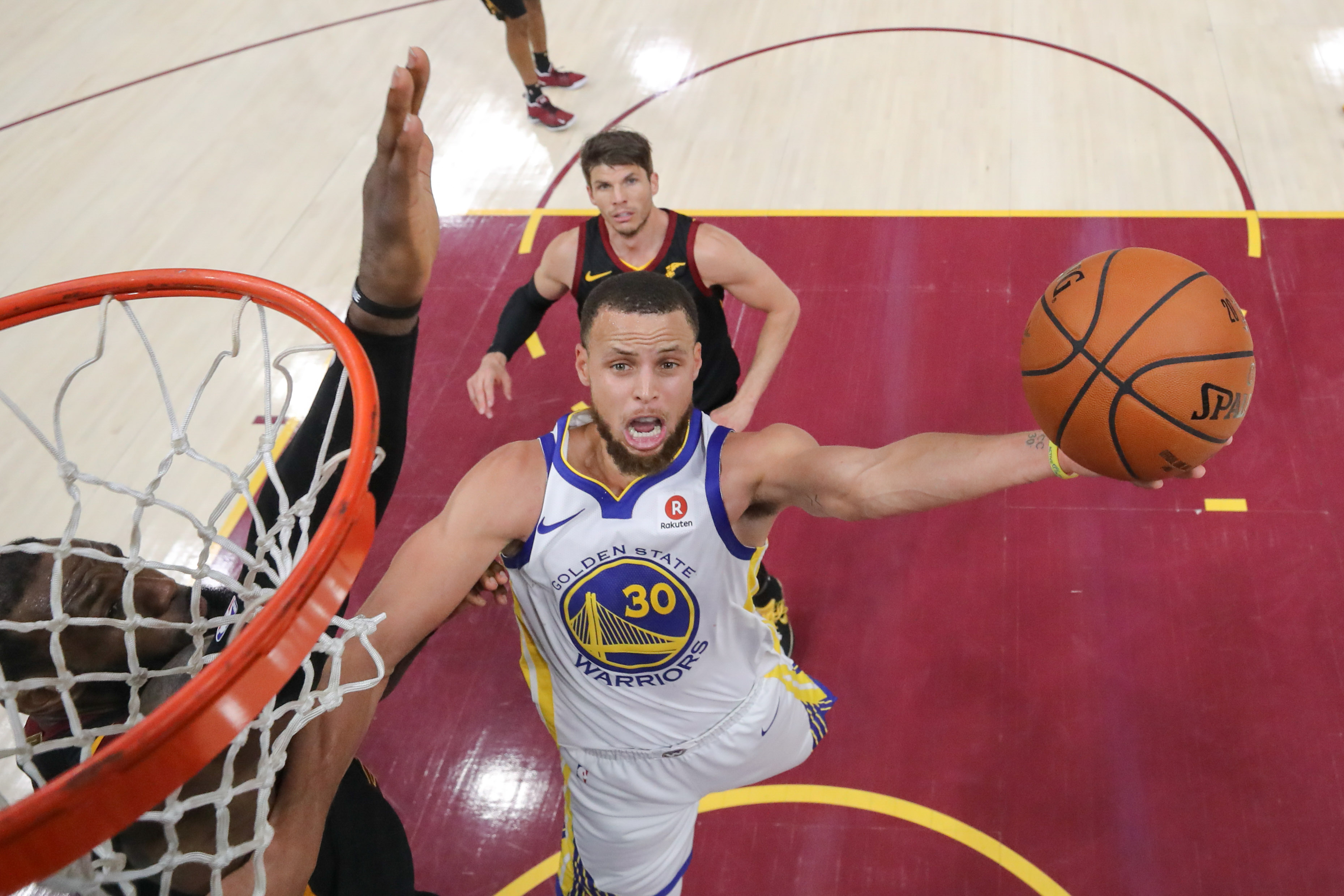 June 8, 2018; Cleveland, OH, USA; Golden State Warriors guard Stephen Curry (30) shoots the basketball against Cleveland Cavaliers forward LeBron James (23) during the fourth quarter in game four of the 2018 NBA Finals at Quicken Loans Arena. The Warriors defeated the Cavaliers 108-85 to complete a four-game sweep. Mandatory Credit: Kyle Terada-Imagn Images