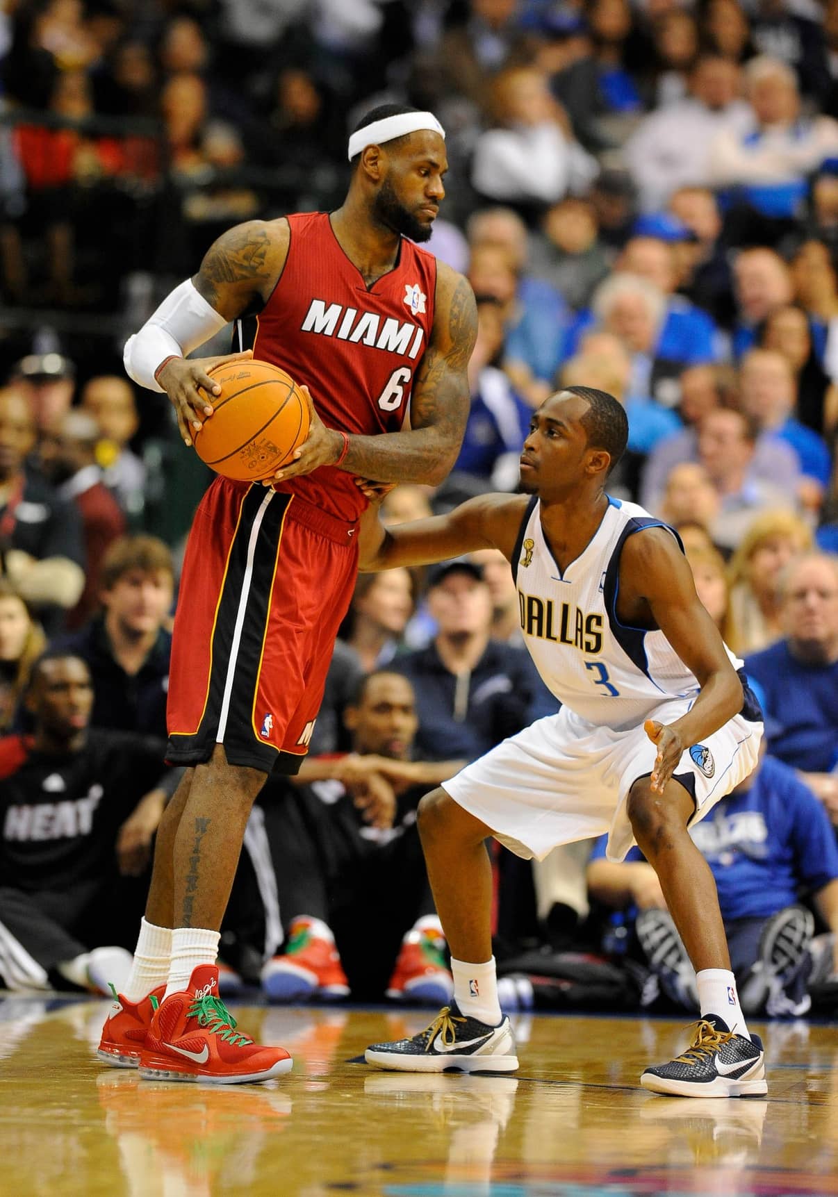 Dec 25, 2011; Dallas, TX, USA; Miami Heat small forward LeBron James (6) is guarded by Dallas Mavericks guard Rodrigue Beaubois (3) during the second quarter at the American Airlines Center. Mandatory Credit: Jerome Miron-Imagn Images