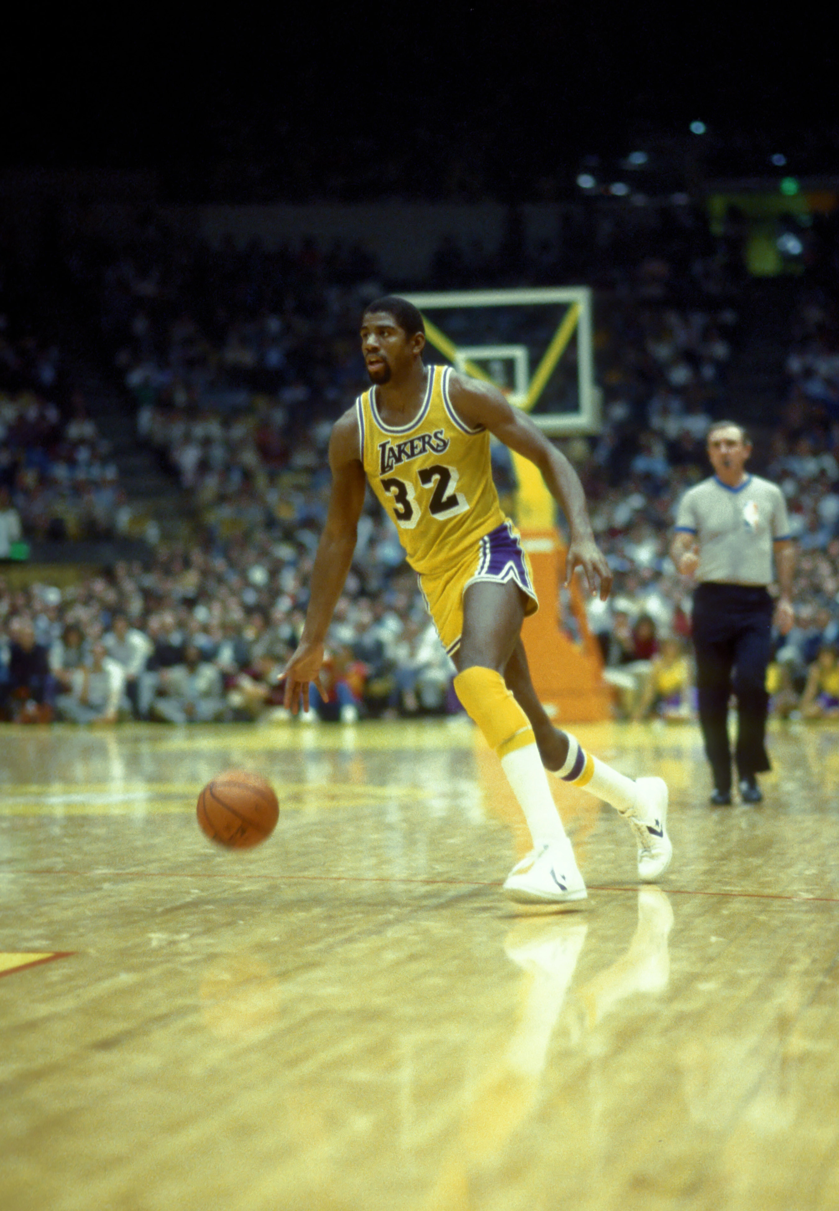 Feb 1983; Los Angeles, CA; USA; Los Angeles Lakers guard (32) Magic Johnson in action during the 1983 season. Mandatory Credit: Photo By Malcolm Emmons-Imagn Images copyright (c) Malcolm Emmons