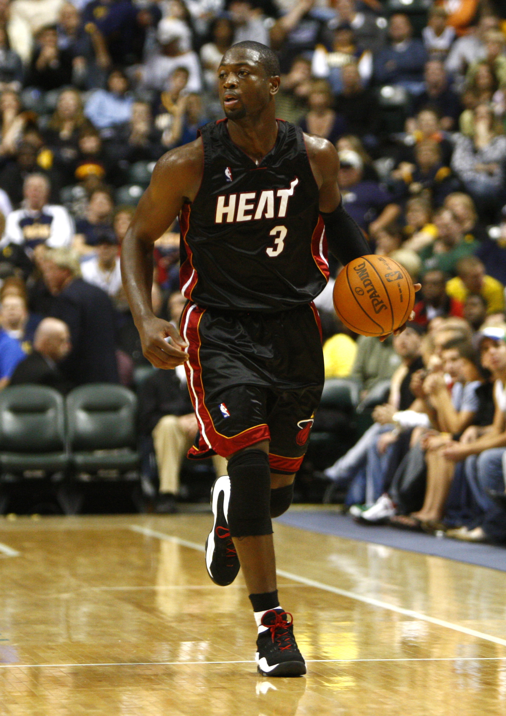 Oct 30, 2009; Indianapolis, IN, USA; Miami Heat guard Dwyane Wade (3) brings the ball down court against the Indiana Pacers in the fourth quarter at Conseco Fieldhouse in Indianapolis, IN. Miami won 96-83. Mandatory Credit: Frank Victores-Imagn Images