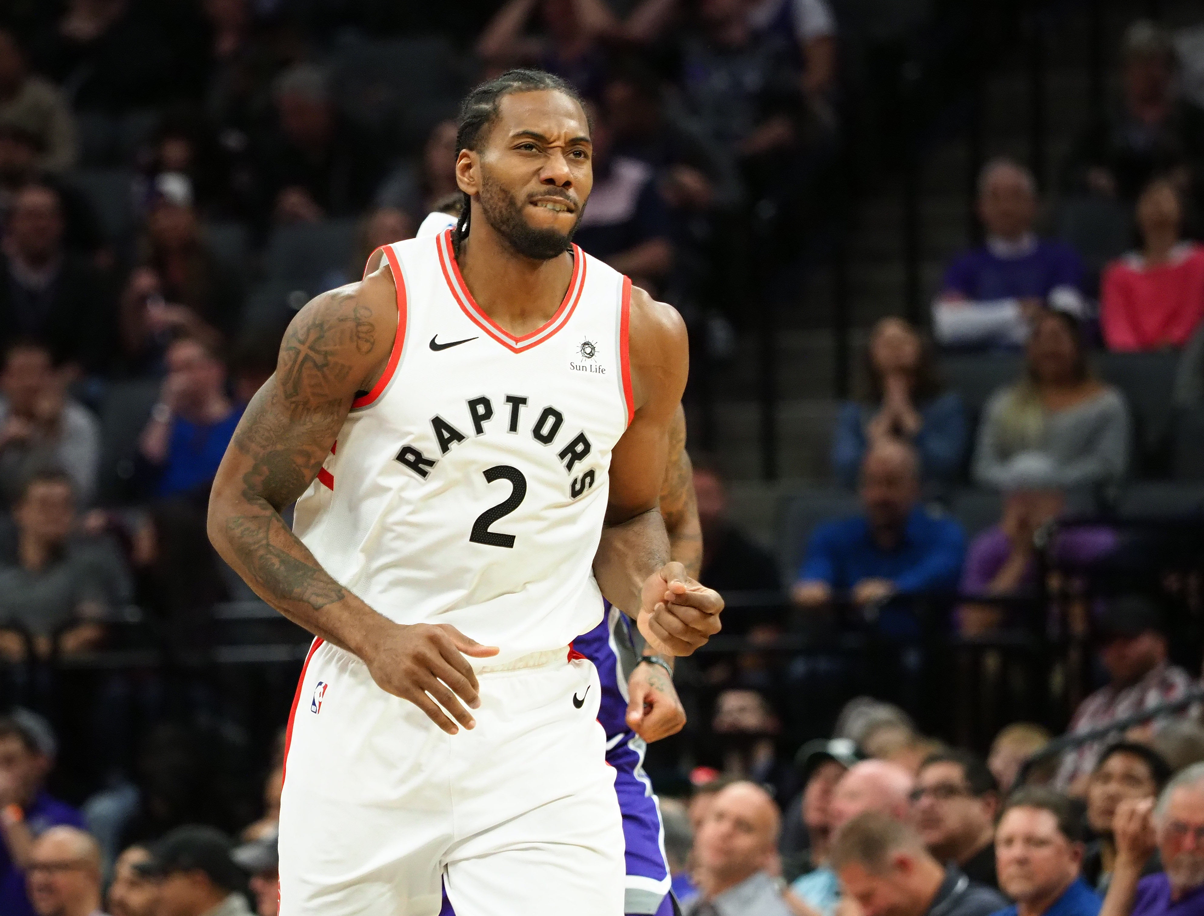 Nov 7, 2018; Sacramento, CA, USA; Toronto Raptors forward Kawhi Leonard (2) reacts after a basket against the Sacramento Kings during the fourth quarter at Golden 1 Center. Mandatory Credit: Kelley L Cox-Imagn Images