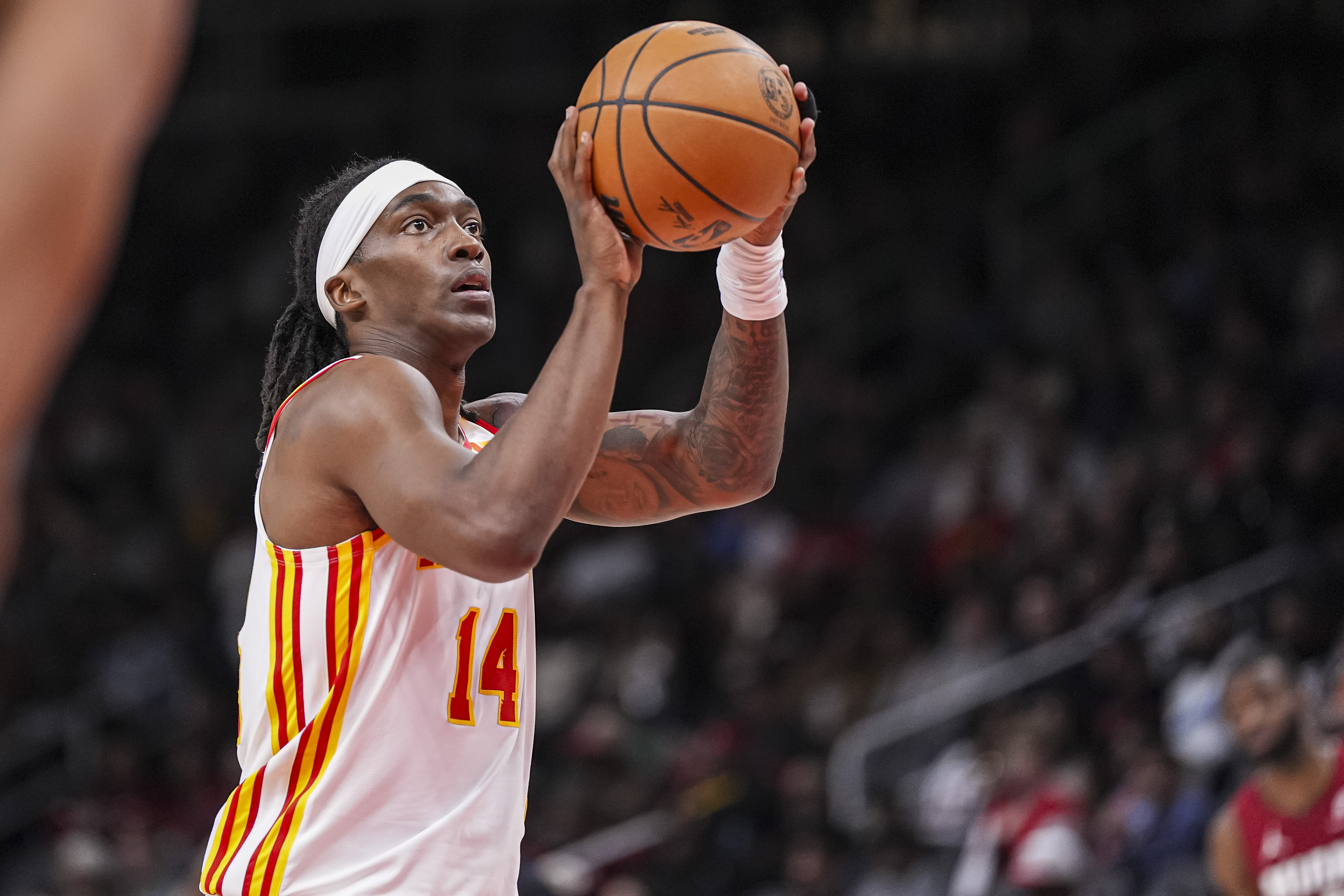Feb 24, 2025; Atlanta, Georgia, USA; Atlanta Hawks guard Terance Mann (14) shoots a free throw against the Miami Heat during the second half at State Farm Arena. Mandatory Credit: Dale Zanine-Imagn Images