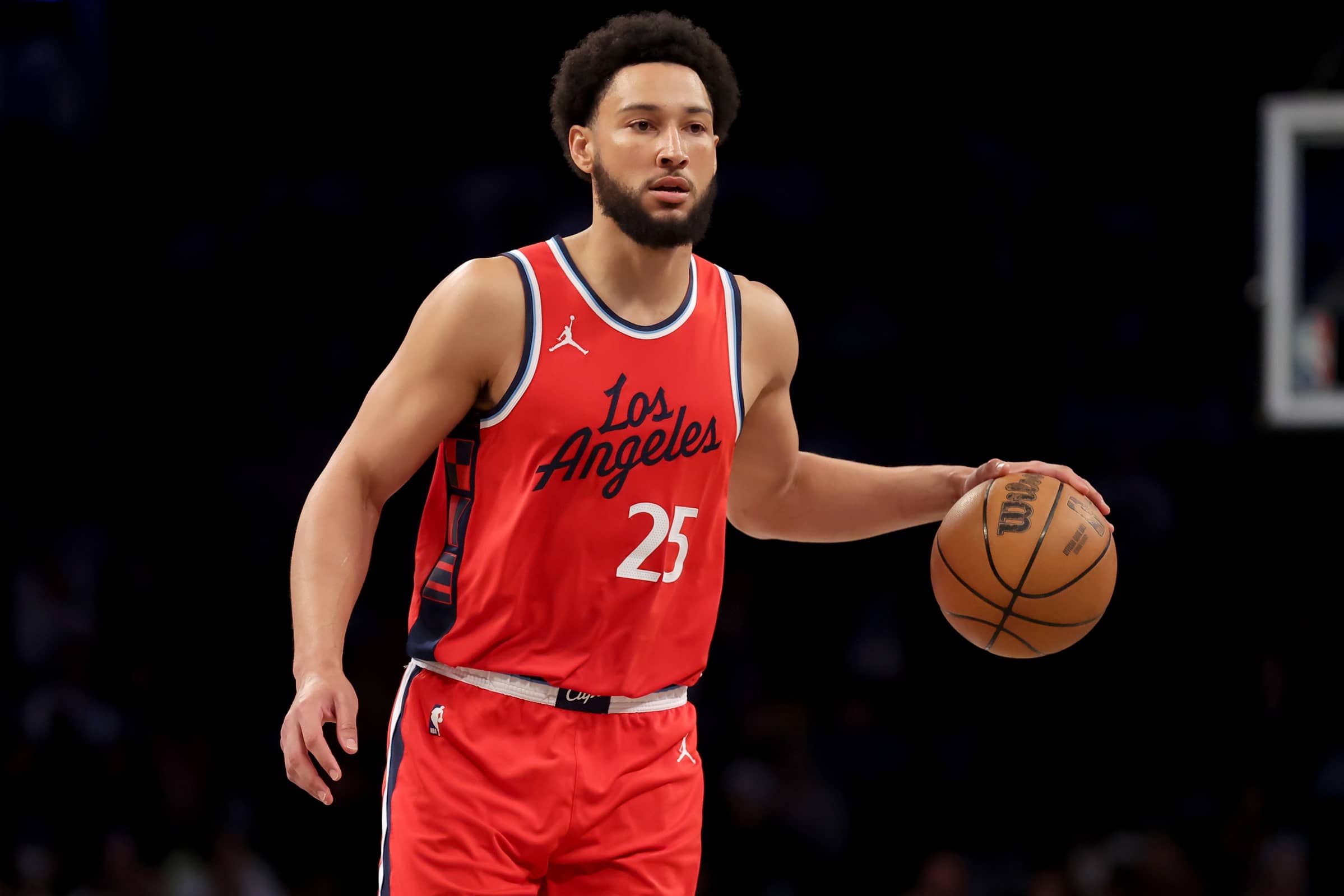 Mar 28, 2025; Brooklyn, New York, USA; Los Angeles Clippers guard Ben Simmons (25) brings the ball up court against the Brooklyn Nets during the second quarter at Barclays Center. Mandatory Credit: Brad Penner-Imagn Images