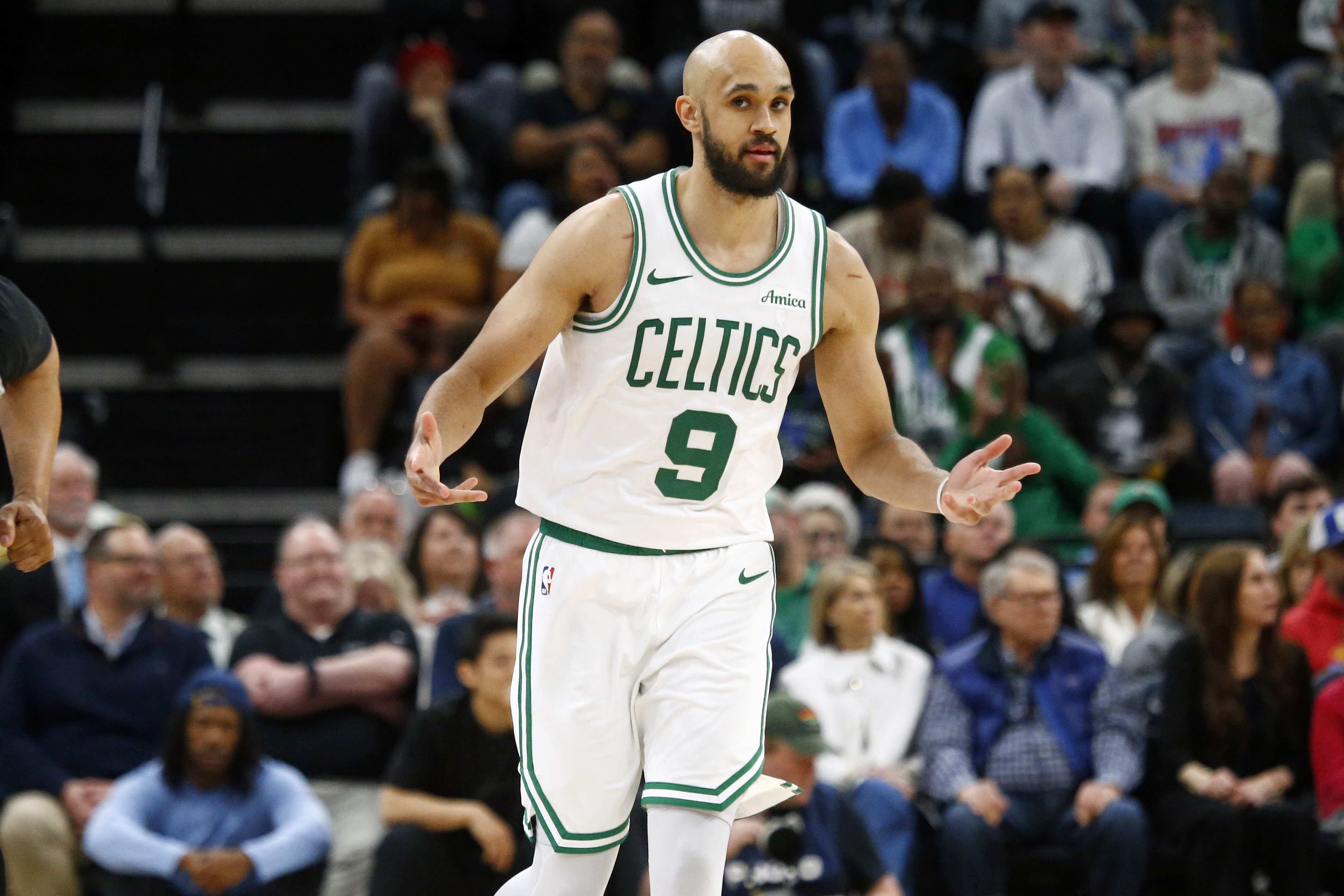 Mar 31, 2025; Memphis, Tennessee, USA; Boston Celtics guard Derrick White (9) reacts after a three point basket during the fourth quarter against the Memphis Grizzlies at FedExForum. Mandatory Credit: Petre Thomas-Imagn Images  