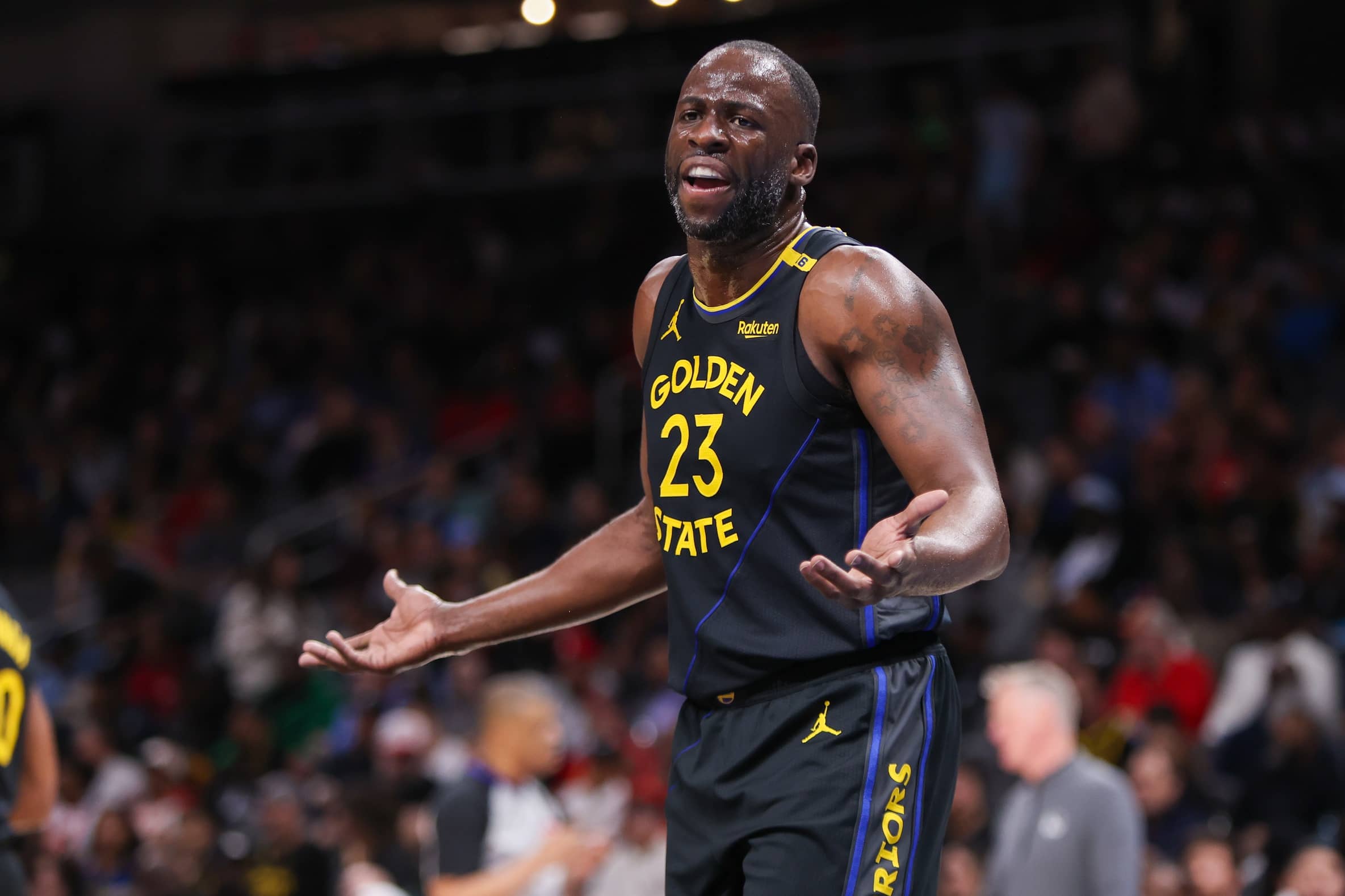 Mar 22, 2025; Atlanta, Georgia, USA; Golden State Warriors forward Draymond Green (23) argues a call against the Atlanta Hawks in the first quarter at State Farm Arena. Mandatory Credit: Brett Davis-Imagn Images