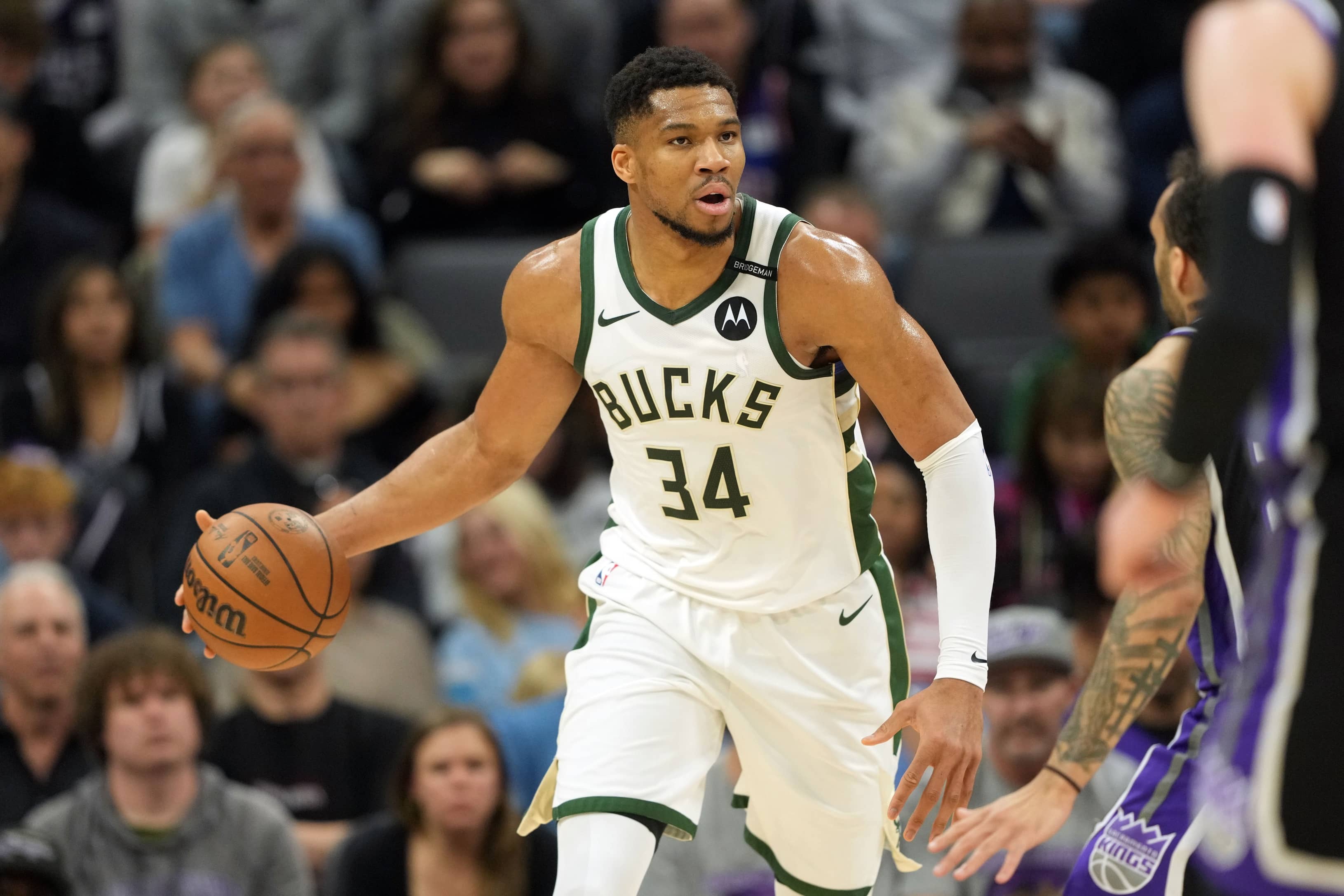 Sacramento, California, USA; Milwaukee Bucks forward Giannis Antetokounmpo (34) dribbles against the Sacramento Kings during the first quarter at Golden 1 Center. Mandatory Credit: Darren Yamashita-Imagn Images