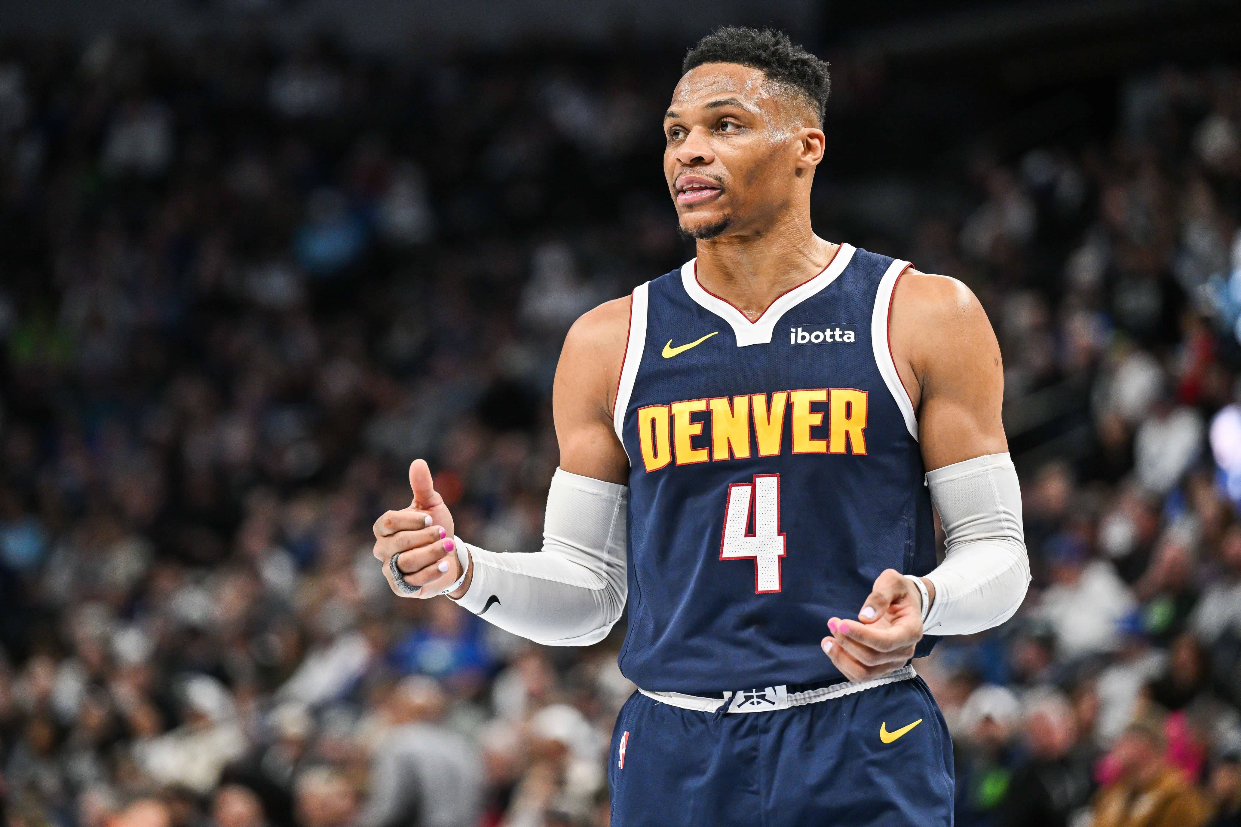 Jan 25, 2025; Minneapolis, Minnesota, USA; Denver Nuggets guard Russell Westbrook (4) reacts during the third quarter against the Minnesota Timberwolves at Target Center. Mandatory Credit: Jeffrey Becker-Imagn Images