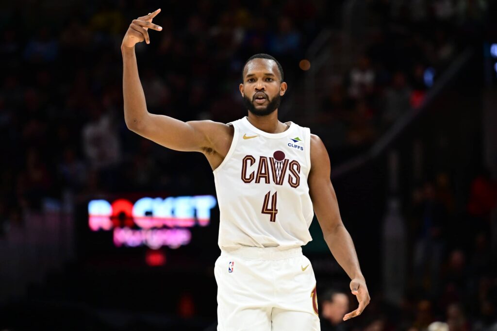 Nov 15, 2025; Cleveland, Ohio, USA; Cleveland Cavaliers center Evan Mobley (4) celebrates his three-point basket in the first quarter against the Memphis Grizzlies at Rocket Arena. Mandatory Credit: David Richard-Imagn Images