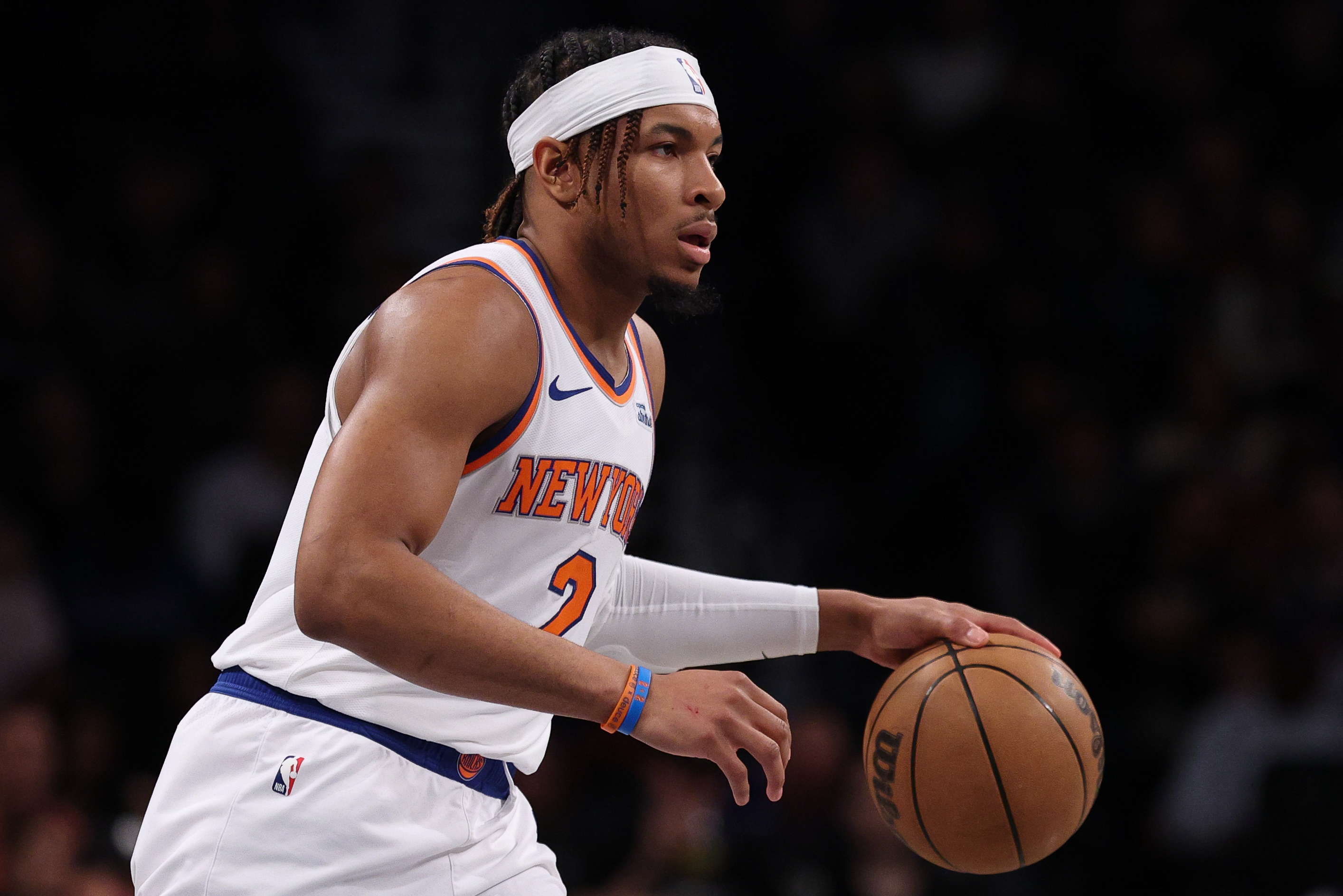 Apr 13, 2025; Brooklyn, New York, USA; New York Knicks guard Miles McBride (2) dribbles up court during the first half against the Brooklyn Nets at Barclays Center. Mandatory Credit: Vincent Carchietta-Imagn Images  
