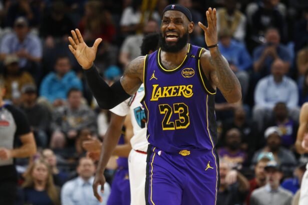 Mar 29, 2025; Memphis, Tennessee, USA; Los Angeles Lakers forward LeBron James (23) reacts during the third quarter against the Memphis Grizzlies at FedExForum. Mandatory Credit: Petre Thomas-Imagn Images