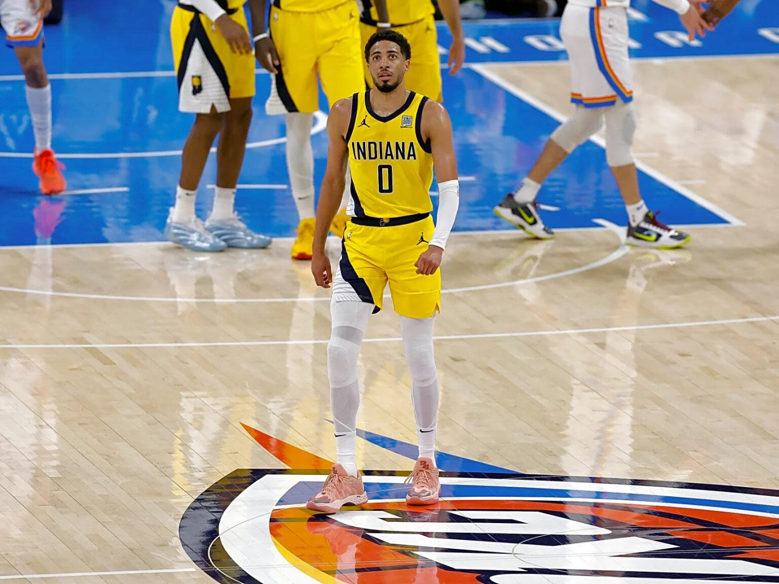 Indiana Pacers guard Tyrese Haliburton (0) walks back to the team bench in the first quarter against the Oklahoma City Thunder during game five of the 2025 NBA Finals at Paycom Center. Mandatory Credit: Alonzo Adams-Imagn Images