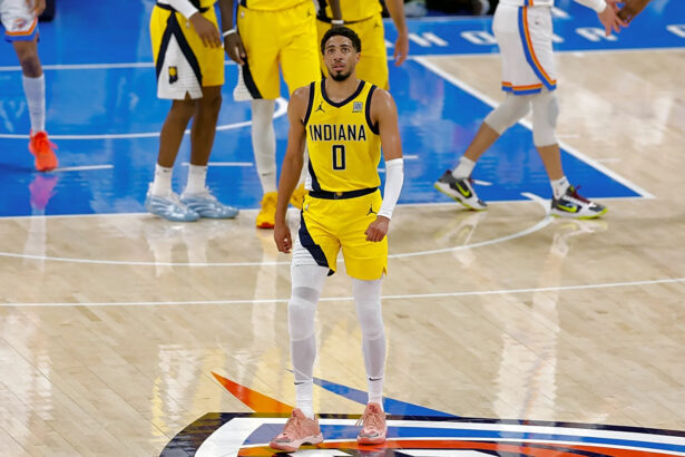Indiana Pacers guard Tyrese Haliburton (0) walks back to the team bench in the first quarter against the Oklahoma City Thunder during game five of the 2025 NBA Finals at Paycom Center. Mandatory Credit: Alonzo Adams-Imagn Images