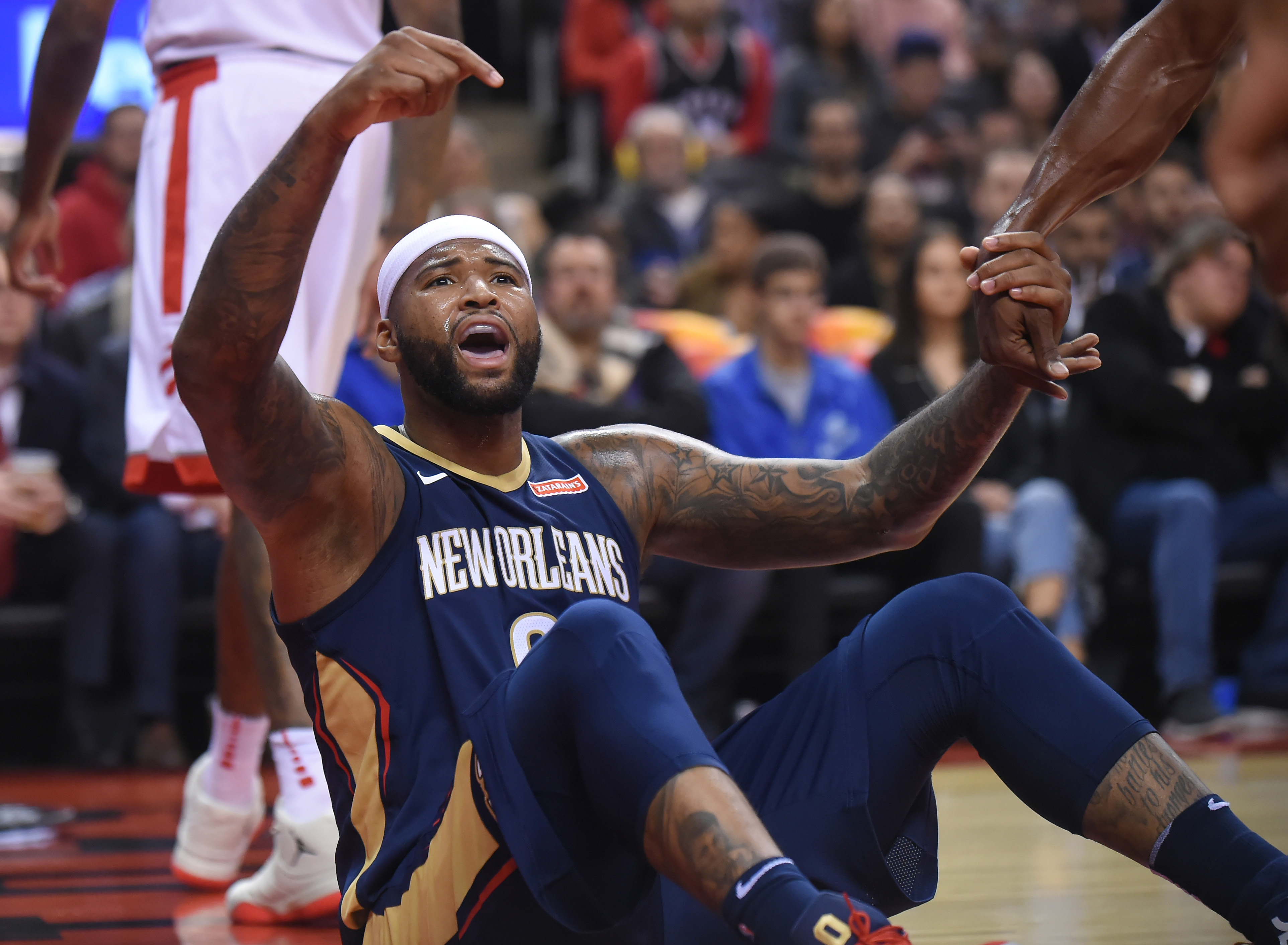 Nov 9, 2017; Toronto, Ontario, CAN; New Orleans Pelicans forward DeMarcus Cousins (0) reacts after being fouled in the first half against Toronto Raptors at Air Canada Centre. Mandatory Credit: Dan Hamilton-Imagn Images  