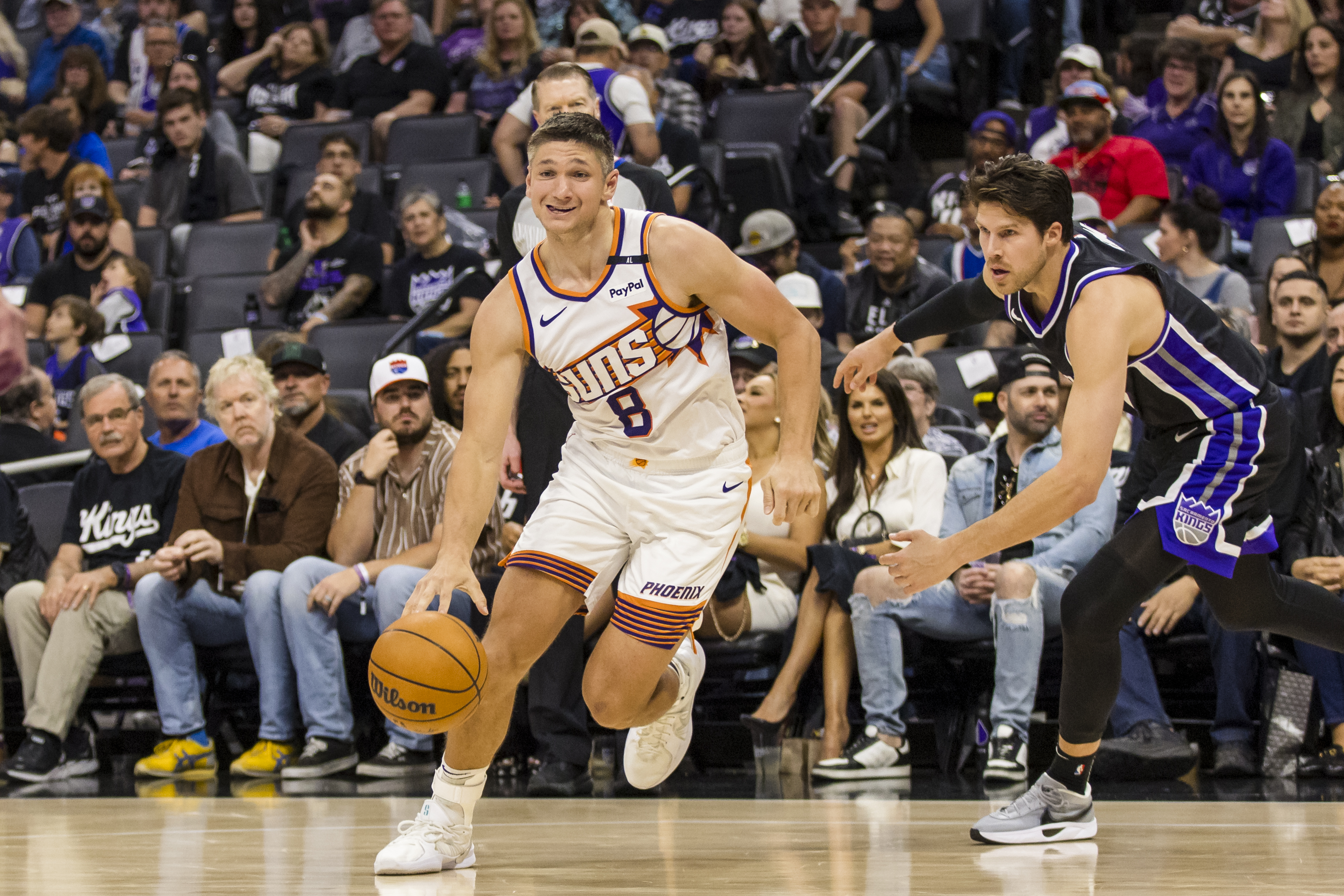 Apr 13, 2025; Sacramento, California, USA; Phoenix Suns guard Grayson Allen (8) dribbles against the Sacramento Kings during the fourth quarter at Golden 1 Center. Mandatory Credit: John Hefti-Imagn Images