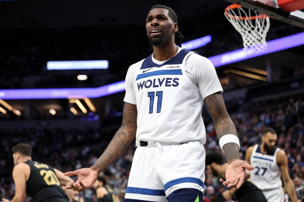 Jan 18, 2025; Minneapolis, Minnesota, USA; Minnesota Timberwolves center Naz Reid (11) reacts towards a referee during the third quarter against the Cleveland Cavaliers at Target Center. Mandatory Credit: Matt Krohn-Imagn Images