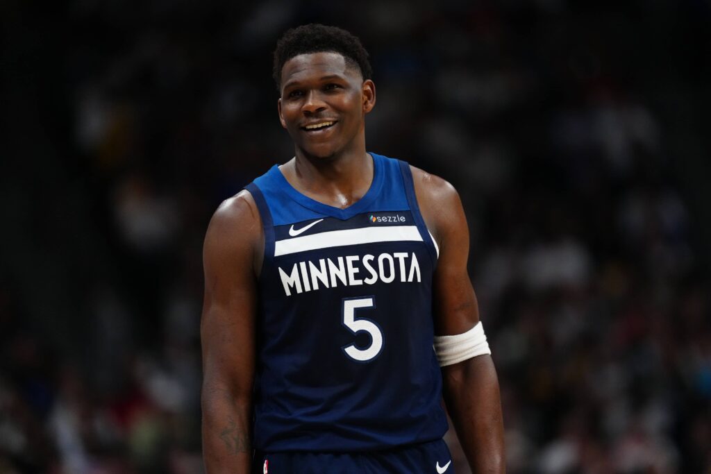 Timberwolves guard Anthony Edwards reacts in the second half against the Nuggets at Ball Arena